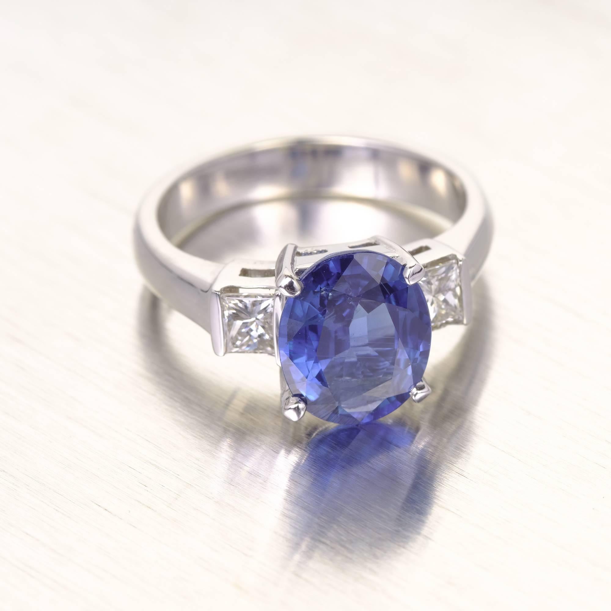 princess cut diamond ring with sapphire side stones