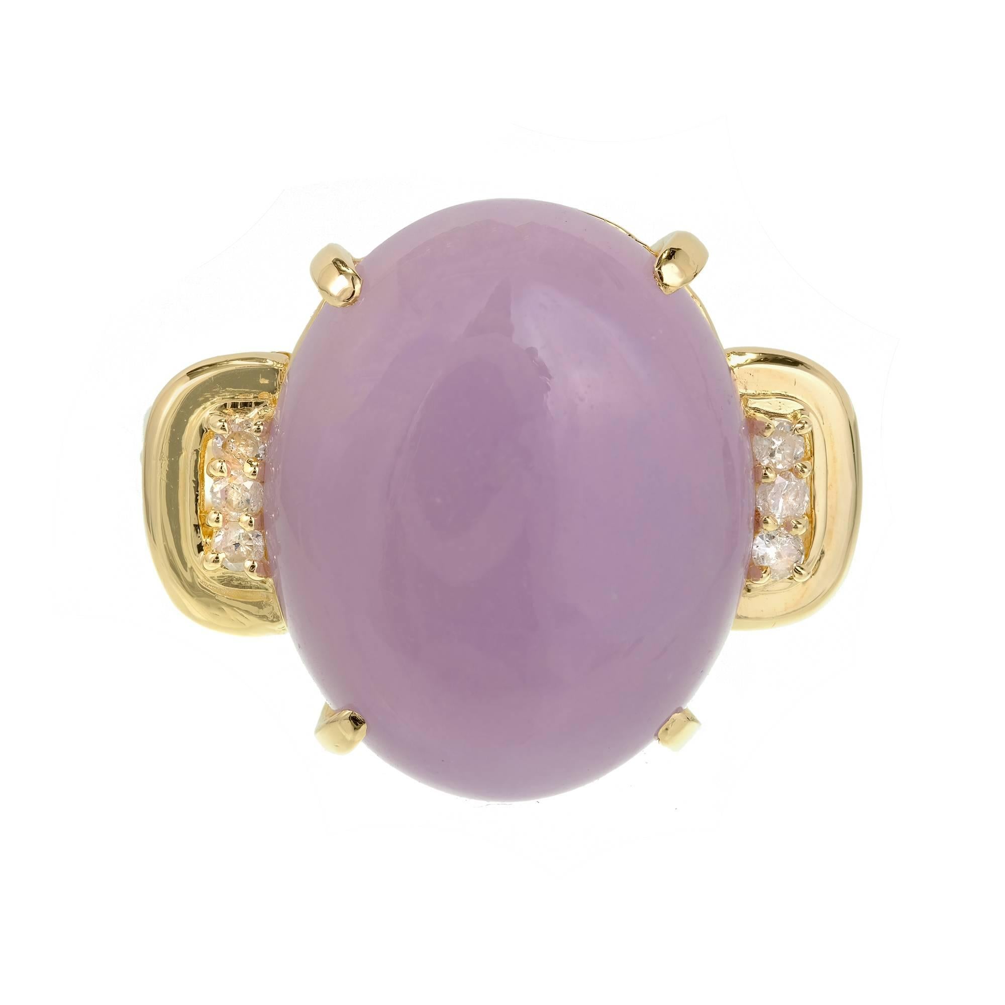 Natural translucent purple cabochon Jadeite Jade and diamond cocktail ring. Custom made 14k yellow gold ring with Diamond accents. 

1 oval purple cabochon Jadeite Jade, 17.66 x 14.24 x 5.39mm
6 full cut Diamonds, approx. total weight .10cts, H,