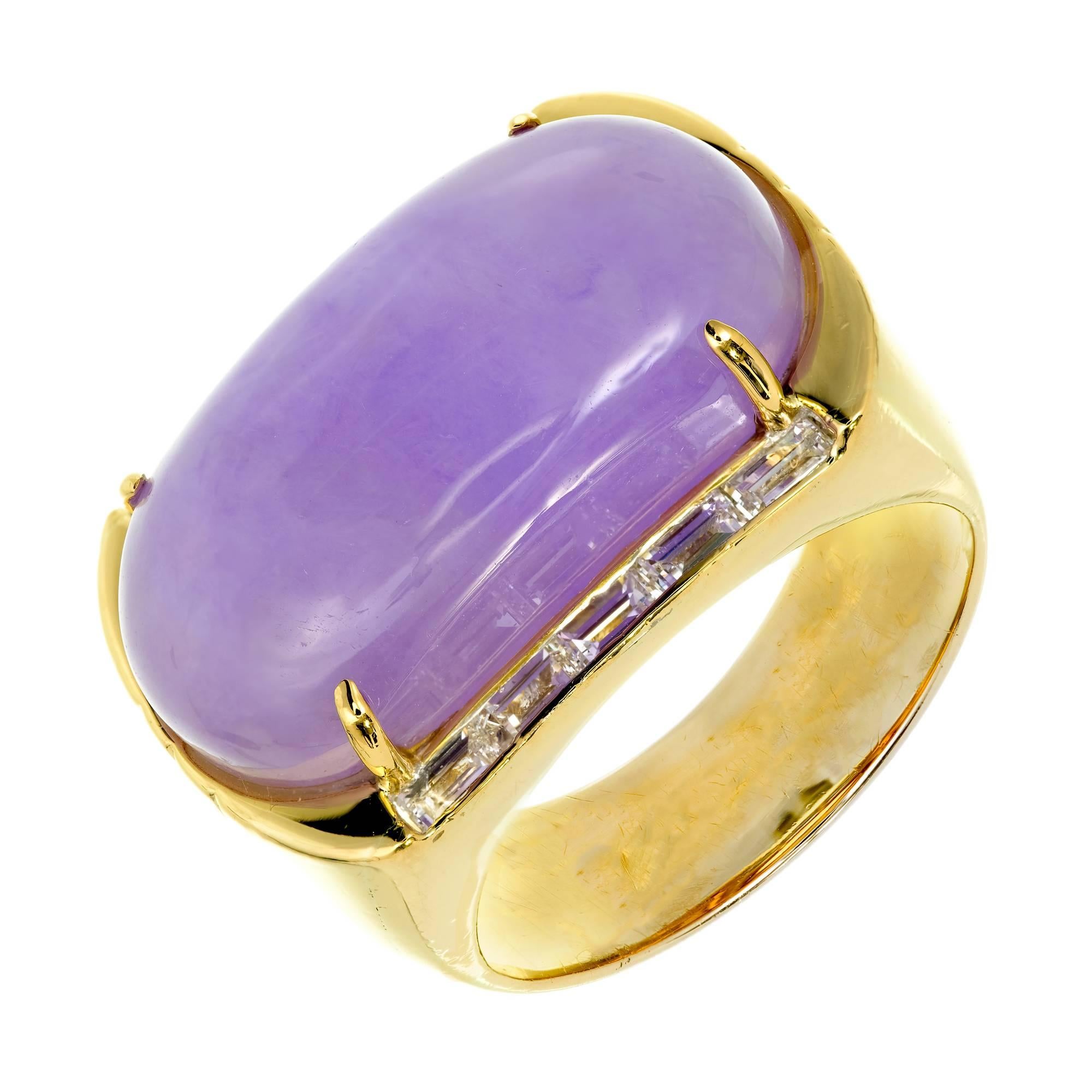 Natural untreated bright purple Jadeite Jade oval cabochon cocktail ring in 18k yellow gold with fine baguette Diamonds. For either a man or a woman.  GIA certified natural Jadeite Jade.

1 oval cabochon purple Jadeite Jade, 23.72 x 12.09 x 7.31mm,