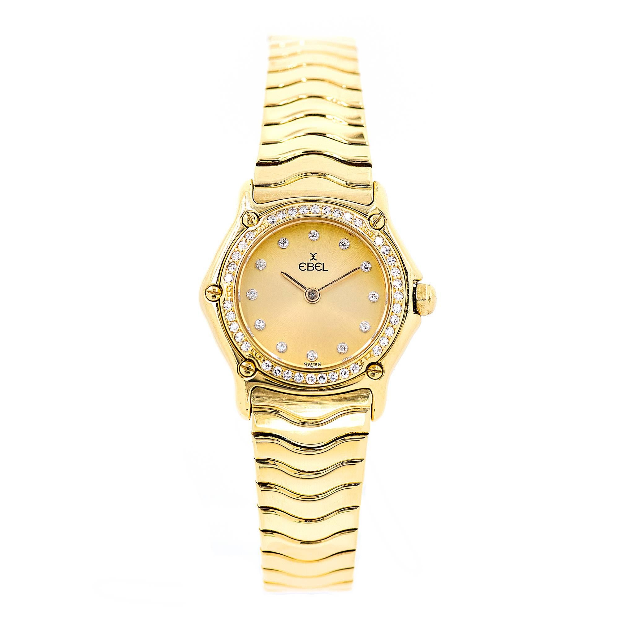 Ladies Ebel Wave wristwatch. All original with solid 18k case and band. Diamond bezel and Diamond dial.

45 diamonds aprox. total weight: .50ct. 
18k yellow gold
Band length: 6 3/8 inches
58.5 grams
Length: 26mm
Width: 23mm
Band width at case: