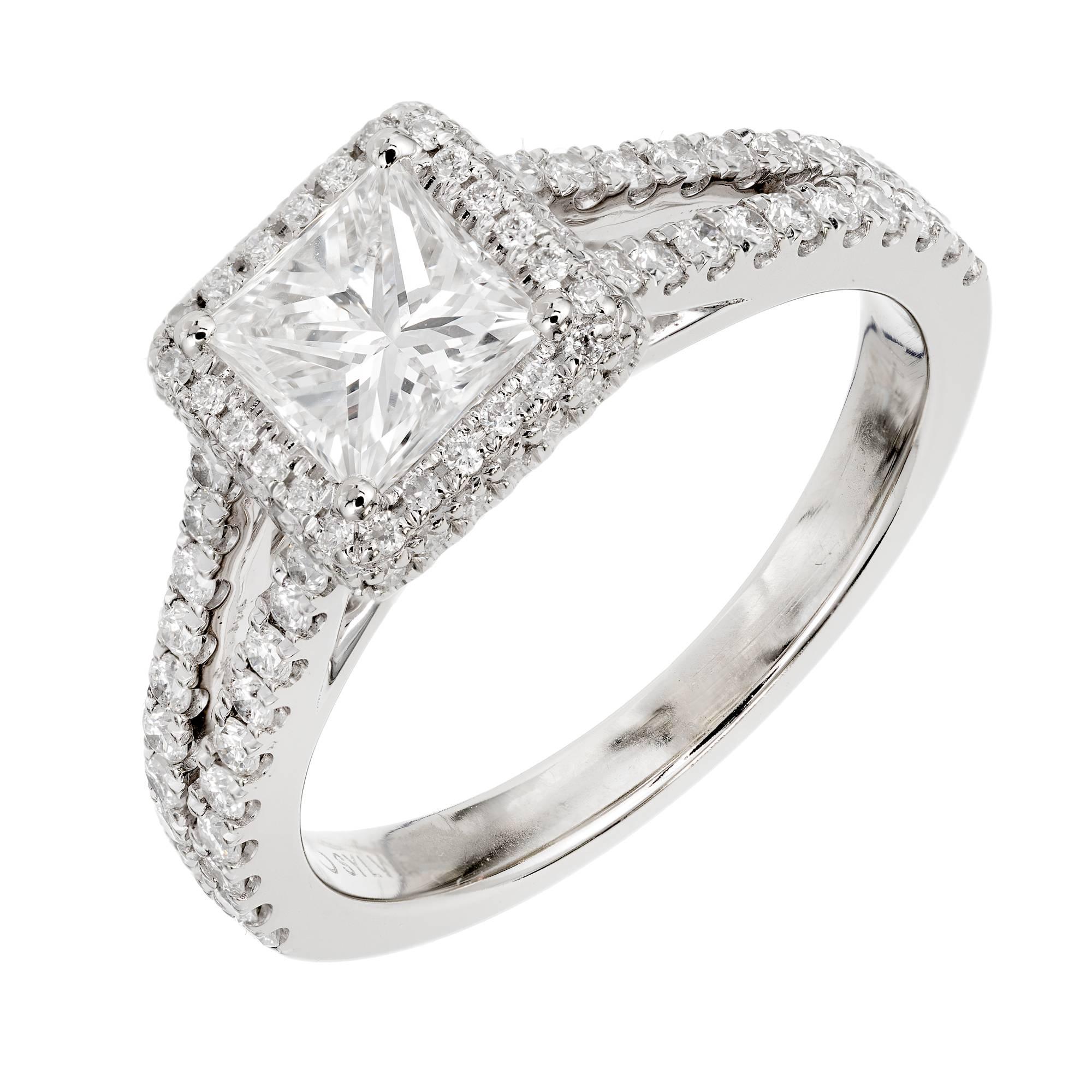 Peter Suchy elegant design split shank Diamond Pavé rolled edge Diamond halo ring with a GIA certified high quality Princess cut Diamond accented by Ideal full cut Diamonds.

1 Princess cut Diamond, approx. total weight .74cts, G, VS1, GIA