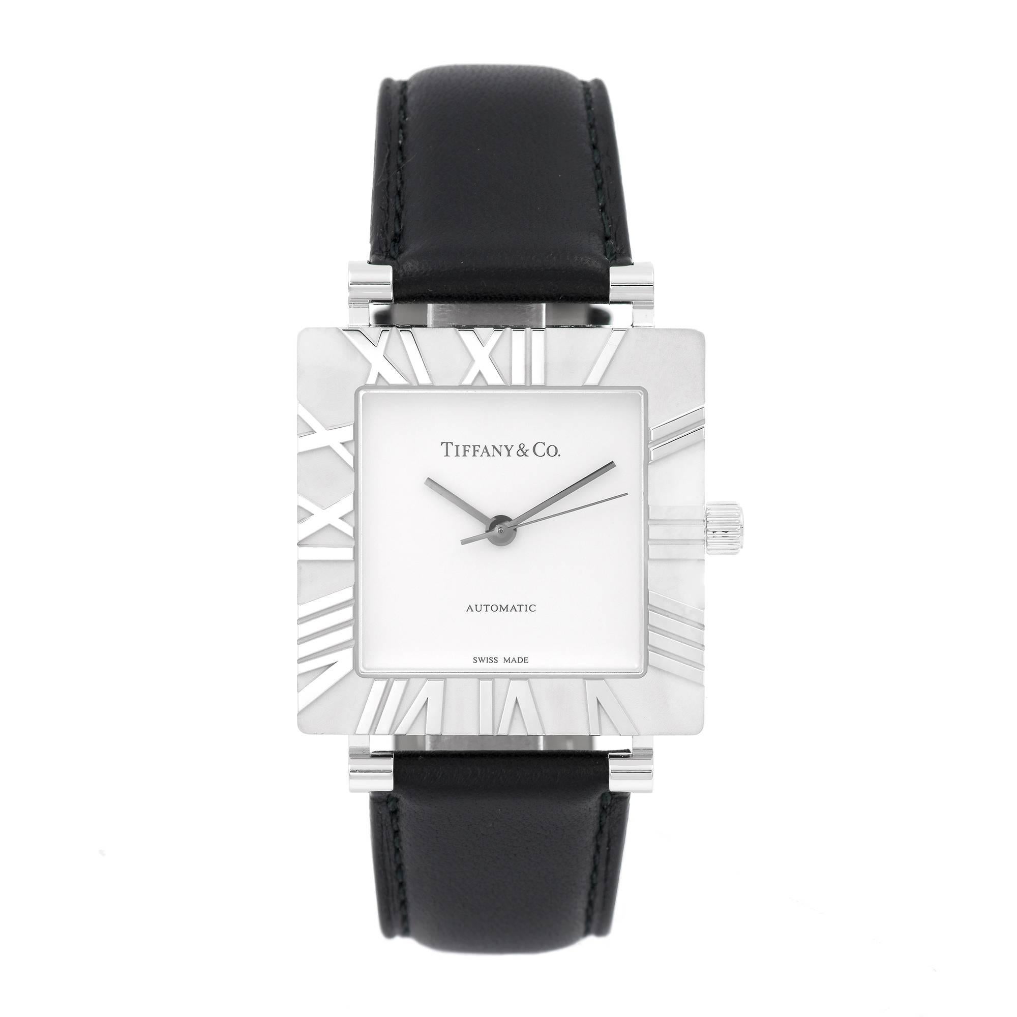 Tiffany & Co Atlas Sterling Silver Automatic wristwatch. 

34mm case, 45mm length, 9mm thickness.
Sapphire crystal, Automatic movement.
Tiffany & Co leather band 22mm band width at case
Outside case: Tiffany & Co. Atlas Ag 925 Water