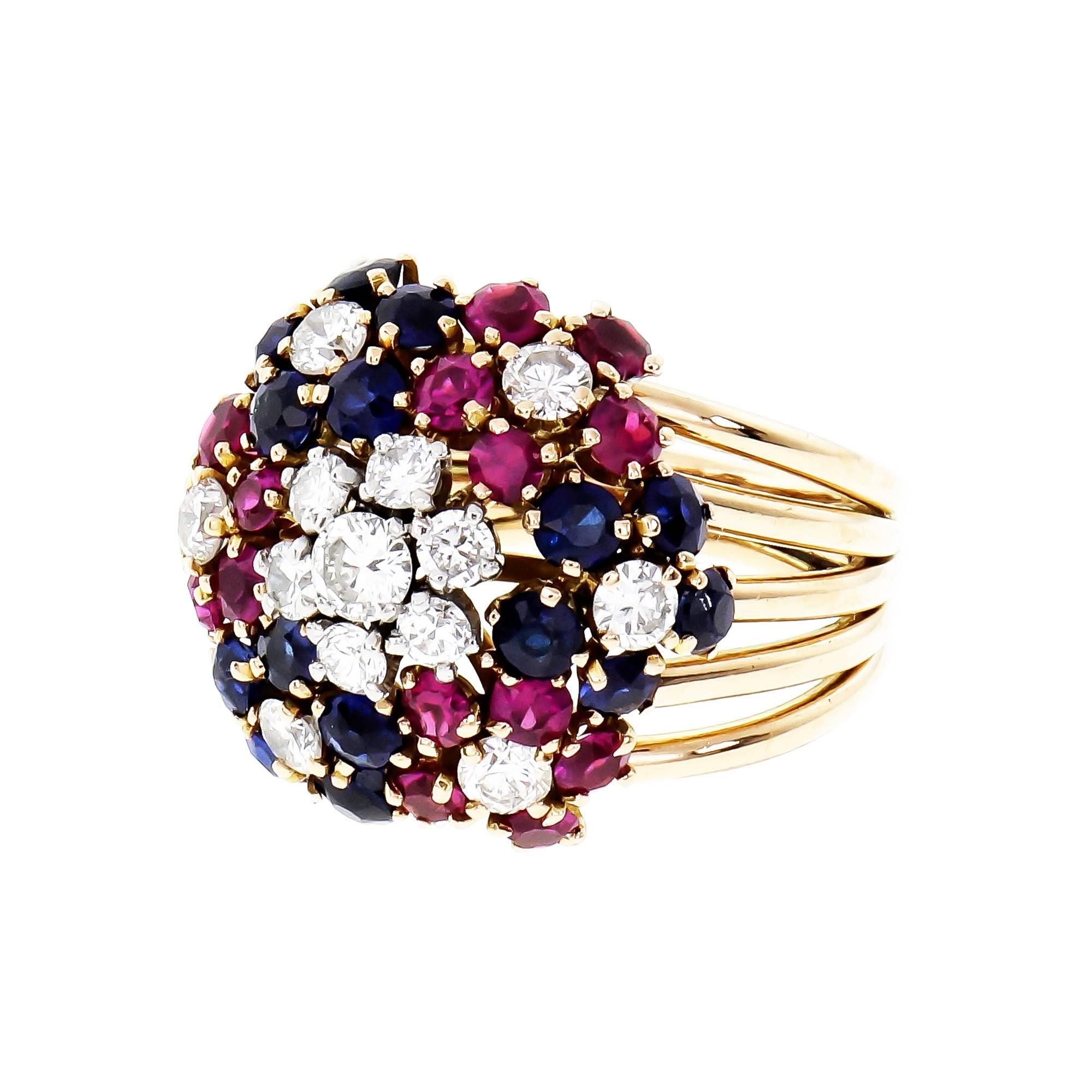 1950's Handmade 18k rose gold with full cut Diamonds and natural Rubies and Sapphires cocktail ring. 

13 round full cut Diamonds, approx. total weight .60cts, F, VS
15 round red Rubies, approx. total weight 1.25cts, SI, 2.5mm
15 round fine blue