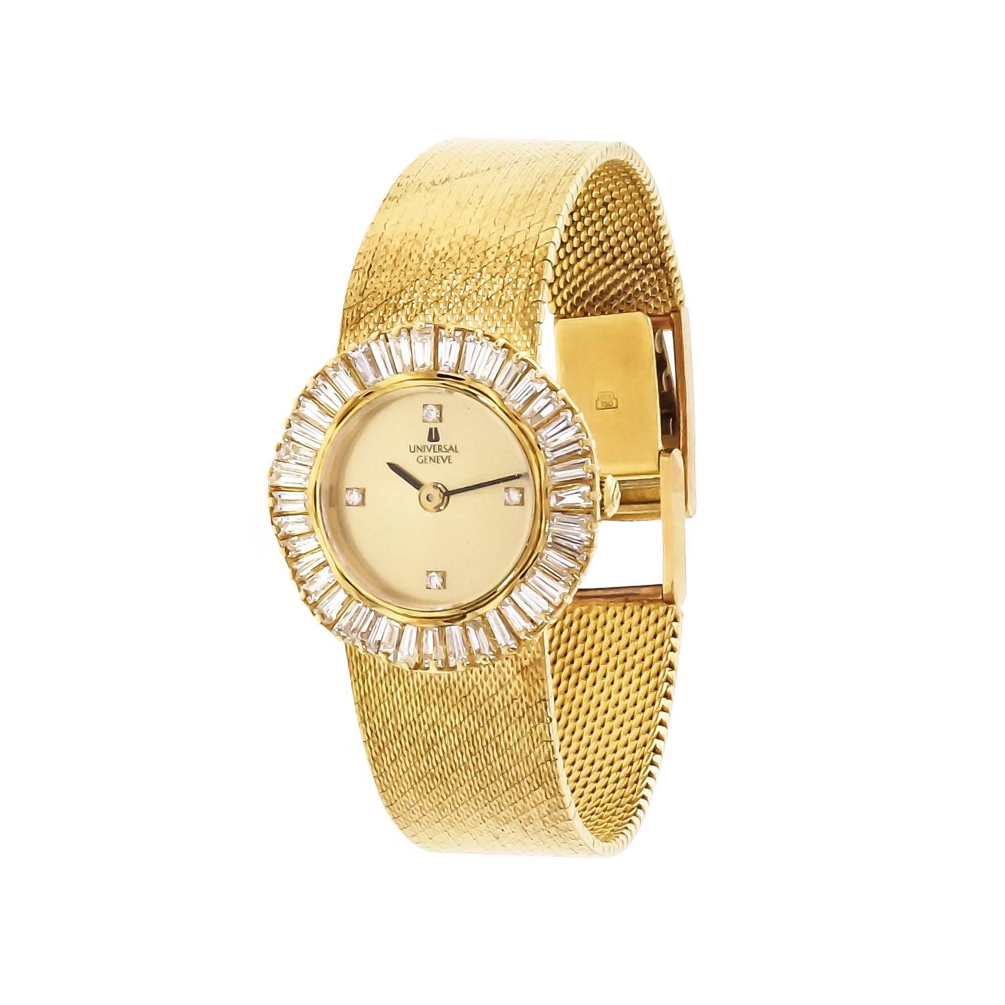 Universal Geneve ladies 18k yellow gold dress watch with baguette Diamond. Diamond bezel and dial. 18k mesh gold. Universal Geneve Quartz movement. Steel case back screws.

18k yellow gold
40 tapered Baguette Diamonds, approx. total weight 2.00cts,
