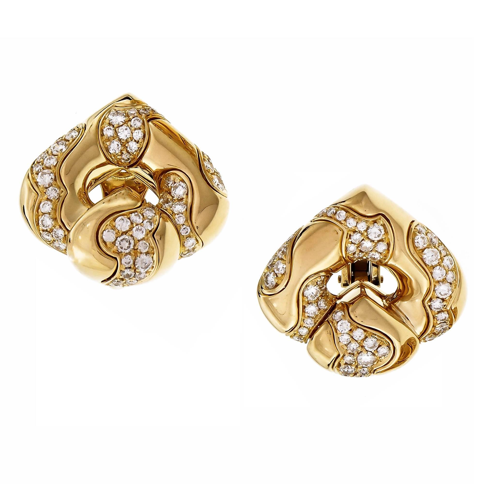 Marina B 18k yellow gold clip post earrings from her “Pardy” line set with sparkly full cut Diamonds. Large size.

114 round full cut Diamonds, approx. total weight 2.30cts, F, VS
18k yellow gold
Tested: 18k
Stamped: 750
Hallmark: Marina B *2875 AL