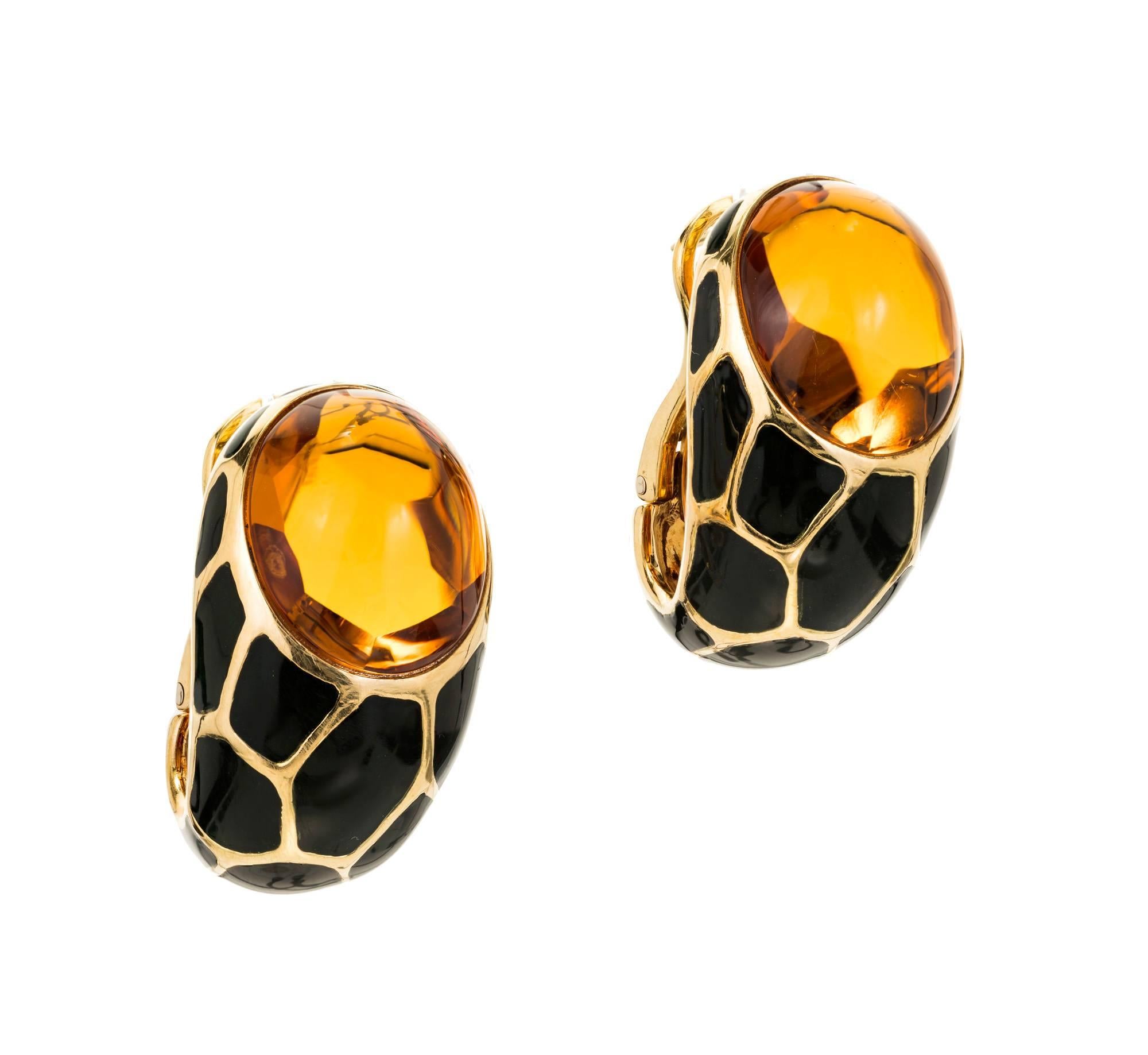 1960s Citrine Italian curved clip and post 18k yellow gold earrings with domed black enameling. Extra heavy and secure clip backs. Orange yellow genuine untreated cabochon Citrines.

Two top gem orangey natural cabochon Citrines 17.5 x 15.5mm,