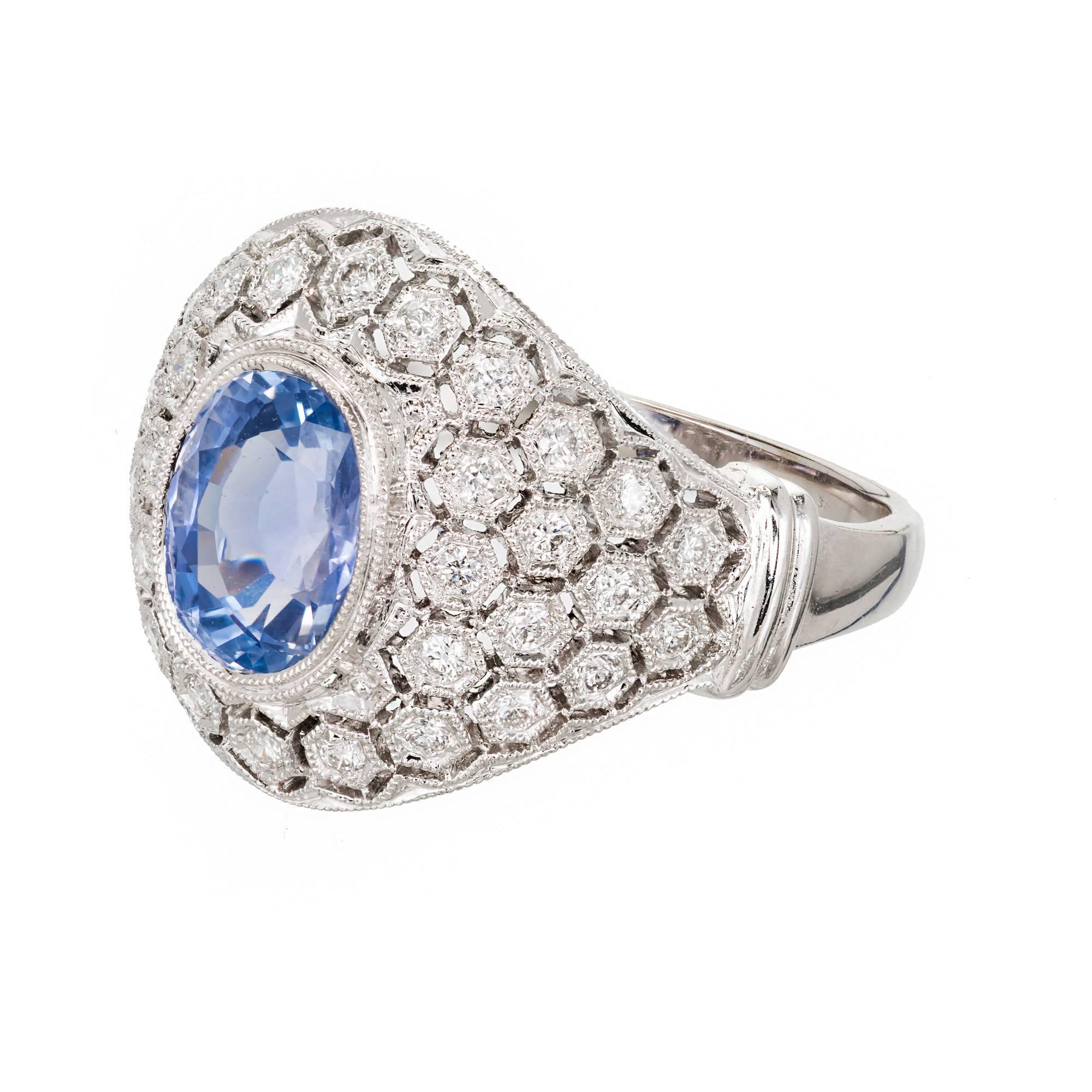 Original 1930-1940 Art Deco 18k white gold cluster cocktail ring with hand made honey comb diamond style cut outs and a natural no heat periwinkle blue Sapphire with no enhancements. GIA certified rare and special. GIA certified 

1 Oval mixed cut