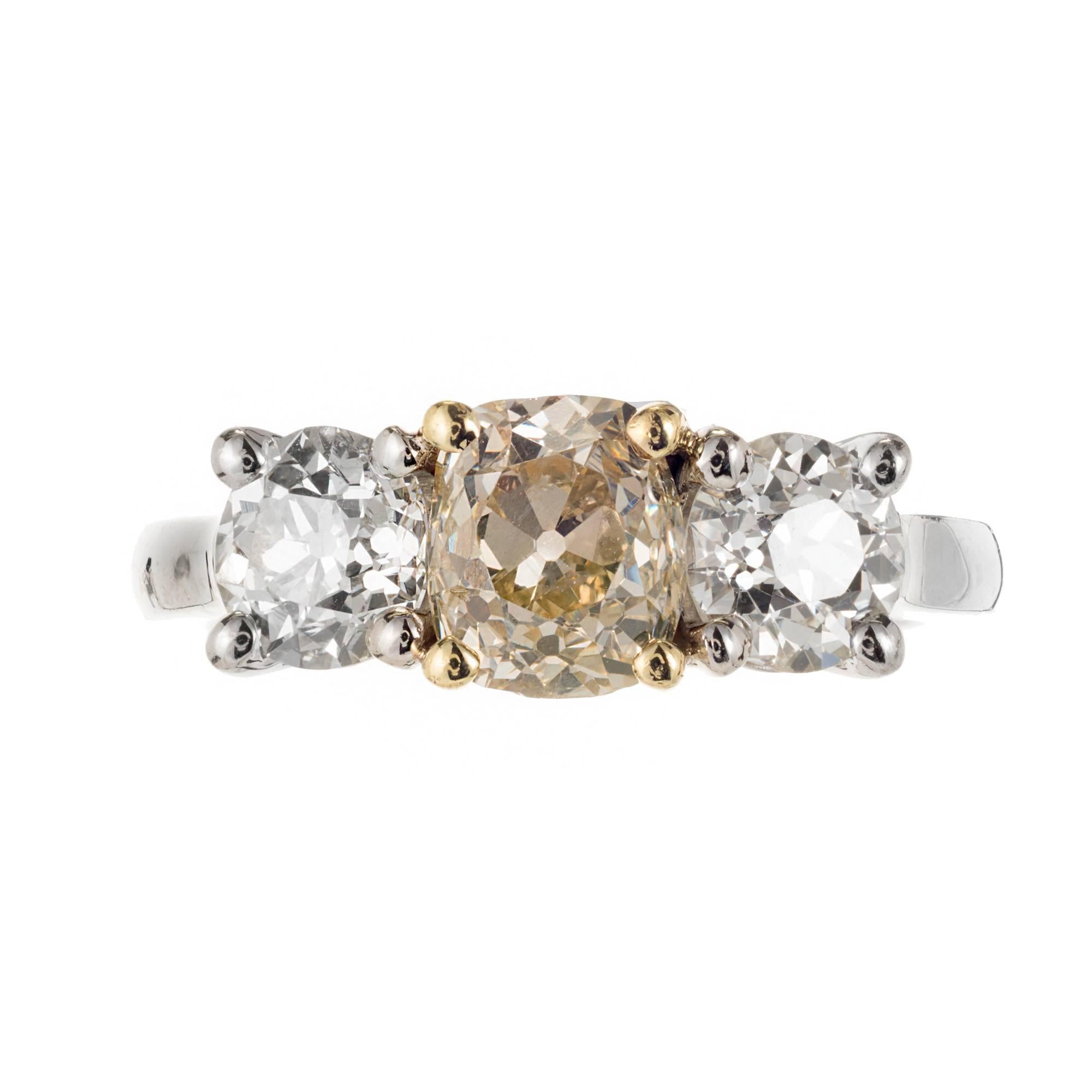 Cushion Cut Peter Suchy 2.78 Carat Three-Stone Fancy Yellow Diamond Platinum Engagement Ring