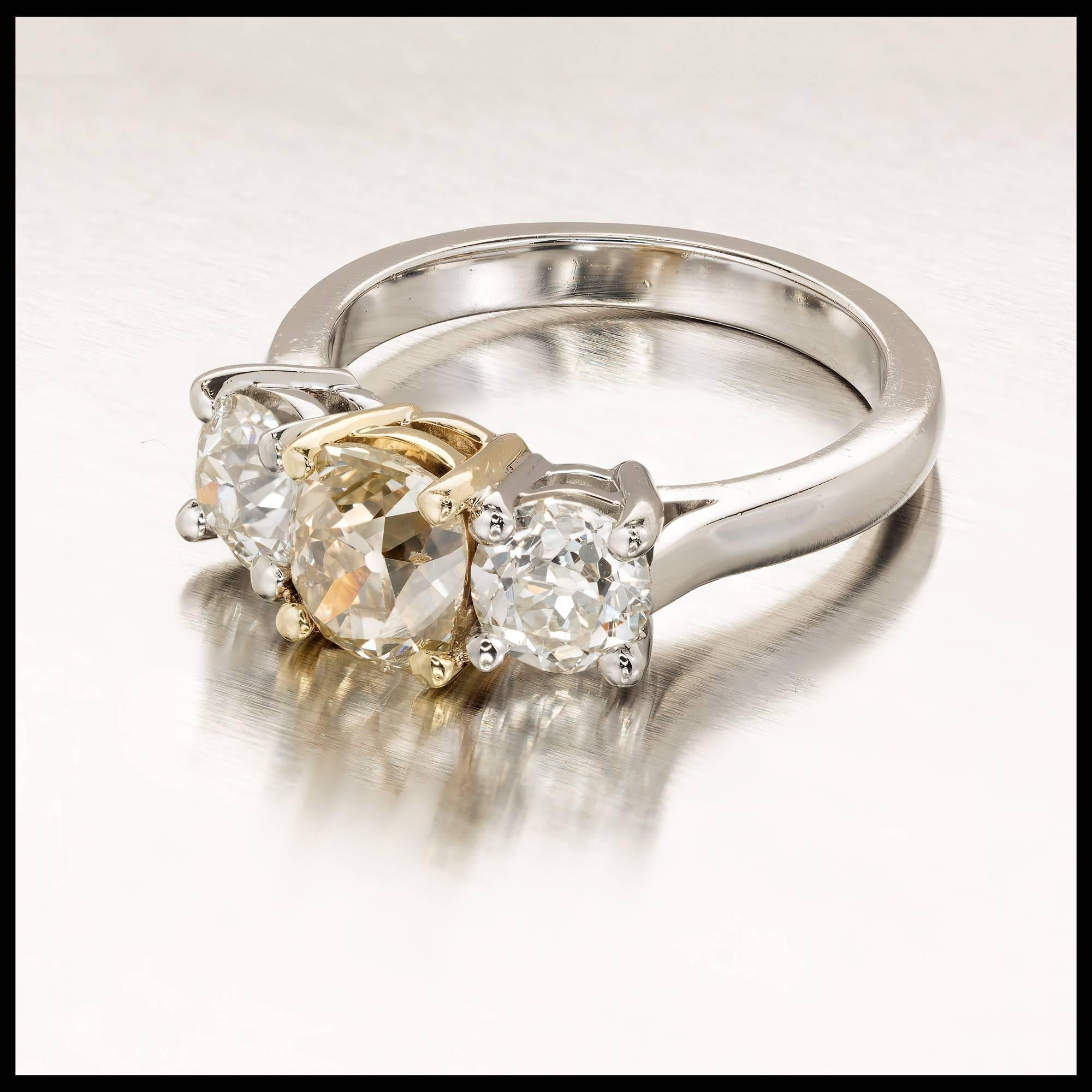 Peter Suchy 2.78 Carat Three-Stone Fancy Yellow Diamond Platinum Engagement Ring In Good Condition In Stamford, CT