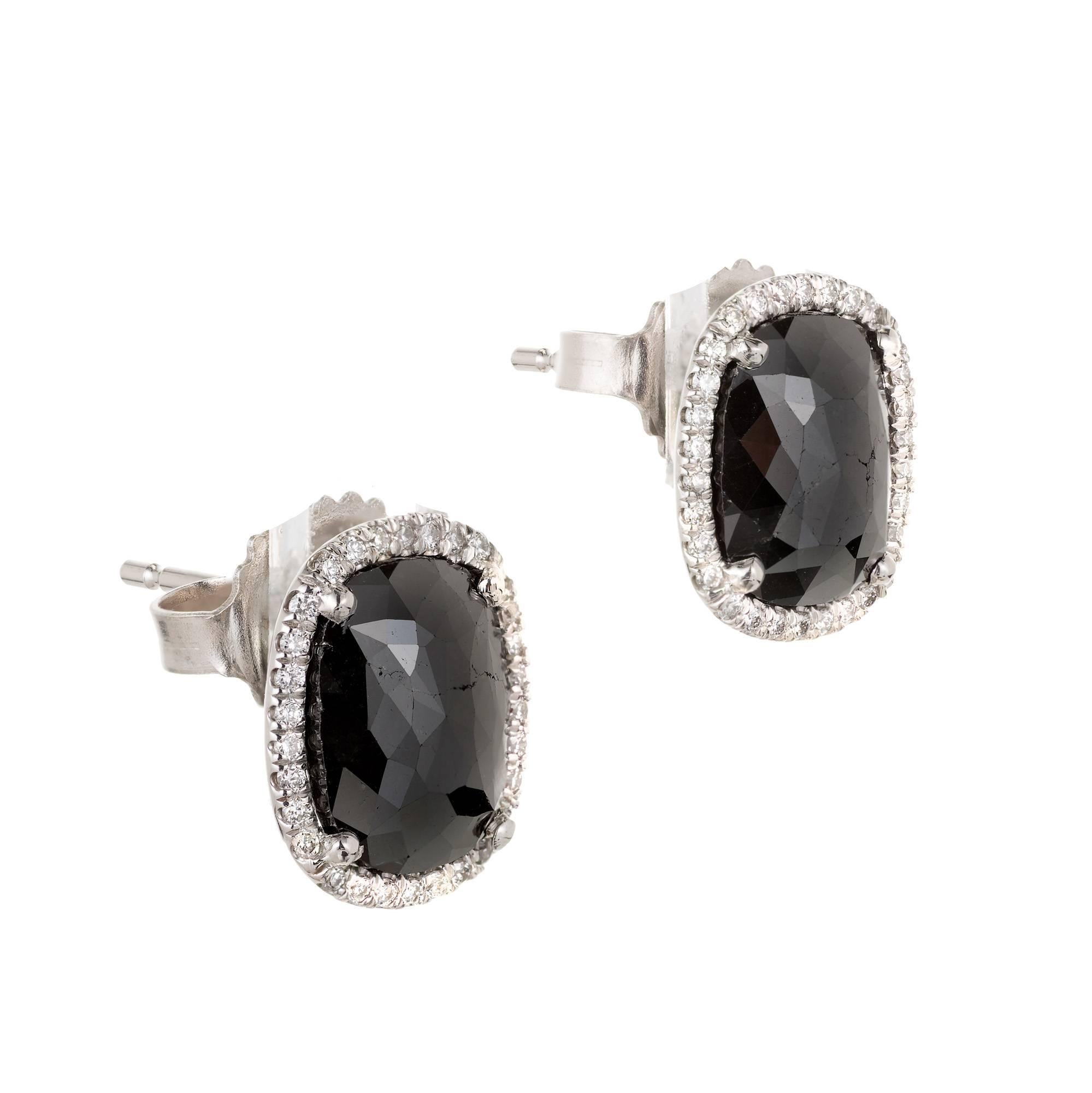  Peter Suchy cushion shape rose cut treated black Diamonds in simple post earrings with full cut Diamonds all around in 18k white gold from the Peter Suchy Workshop. 

1 cushion treated fancy black rose cut black Diamond, approx. total weight