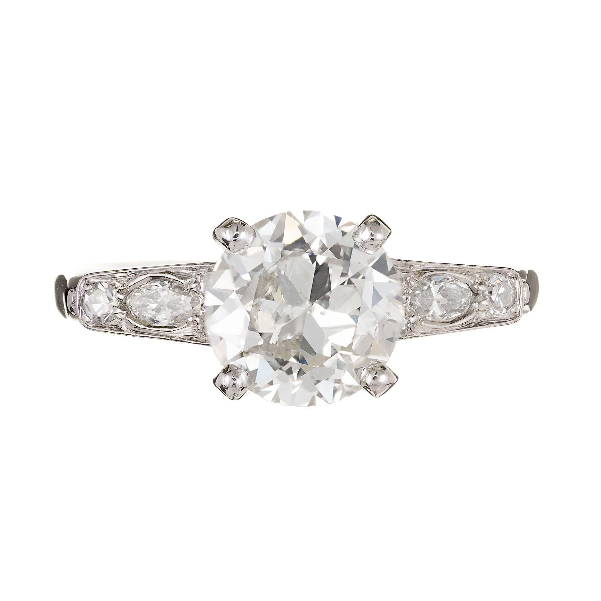 Diamond engagement ring. Platinum setting with Marquise and round Diamonds. EGL certified. 

1 transitional cut round Diamond, approx. total weight 1.52cts, H – I, I1, EGL certificate # US314380002D
2 Marquise Diamonds, approx. total weight .07cts,