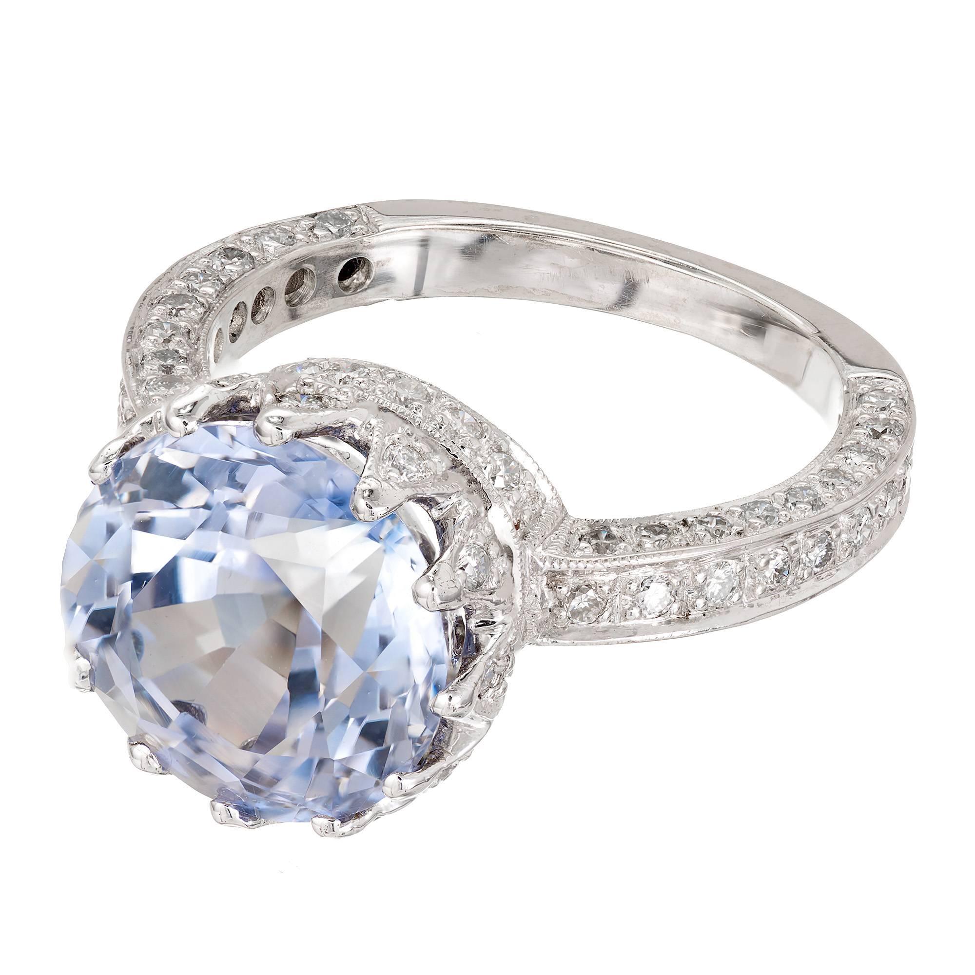 Peter Suchy vintage Inspired queens crown sapphire and diamond engagement ring. 18k white gold setting with Pavé set bright white full cut Diamond accents. The center Sapphire is from an estate circa 1910 in light periwinkle blue old European cut.