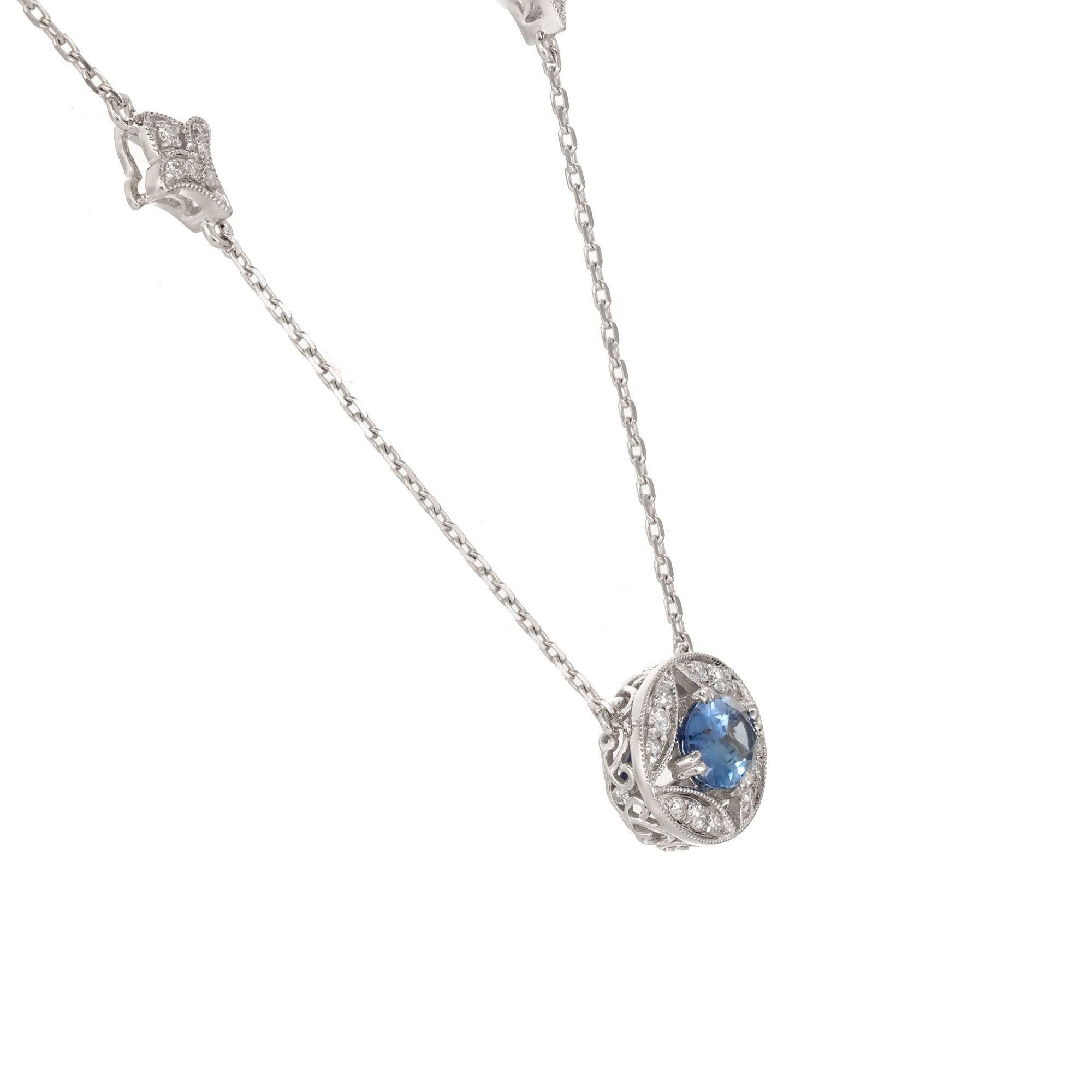 Oval Sapphire Diamond pendant necklace with a bright blue oval Sapphire center stone and accent diamonds, on a 17 inch chain.  

14k white gold
1 oval bright blue Sapphire, approx. total weight 1.00cts, SI
46 round full cut Diamonds, approx. total