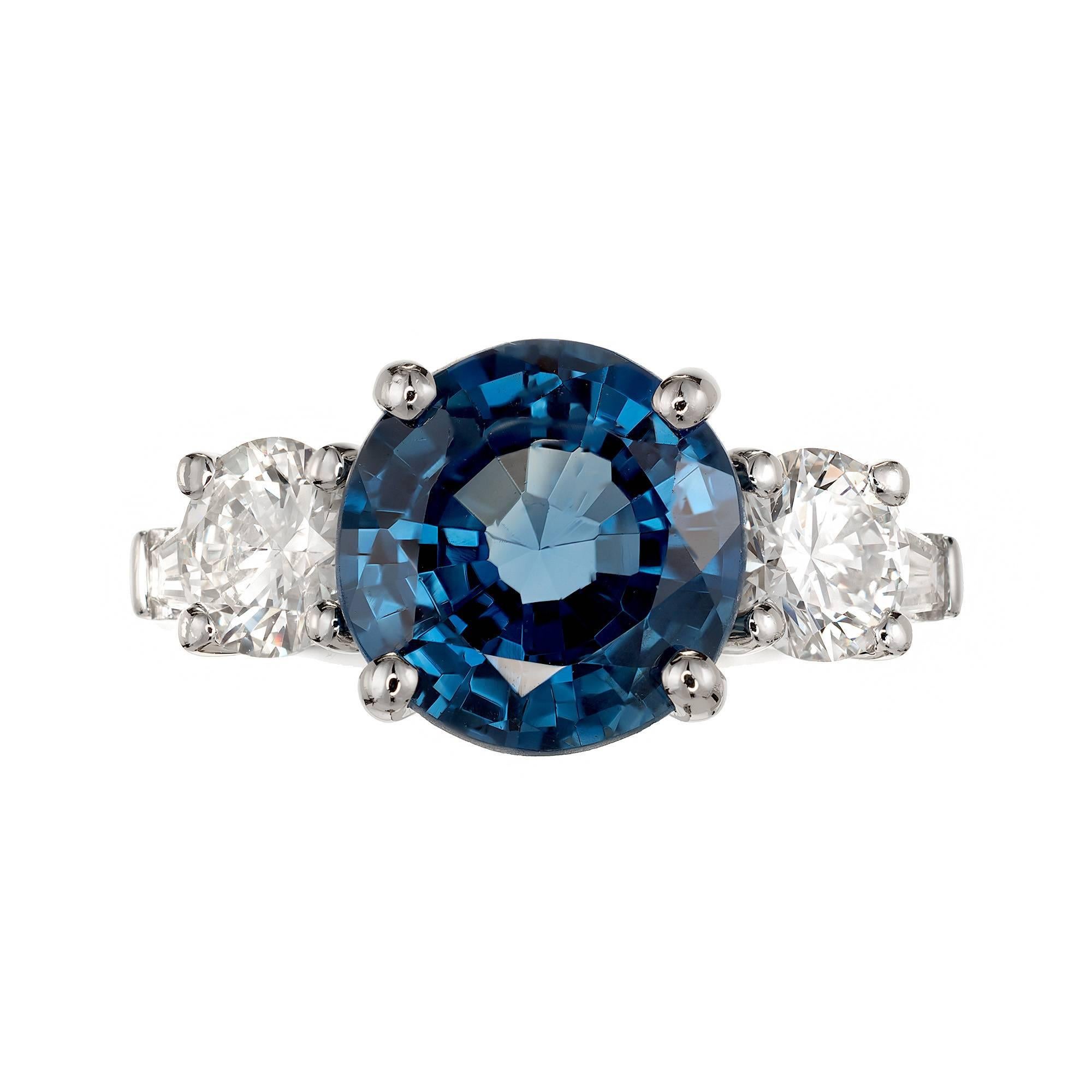 Peter Suchy 4.17ct natural no heat no enhancement Sapphire and diamond engagement ring. Bright blue color with two round and two baguette side diamonds in a platinum three-stone setting. 

1 AGL certified #109005-D natural no heat round mixed cut
