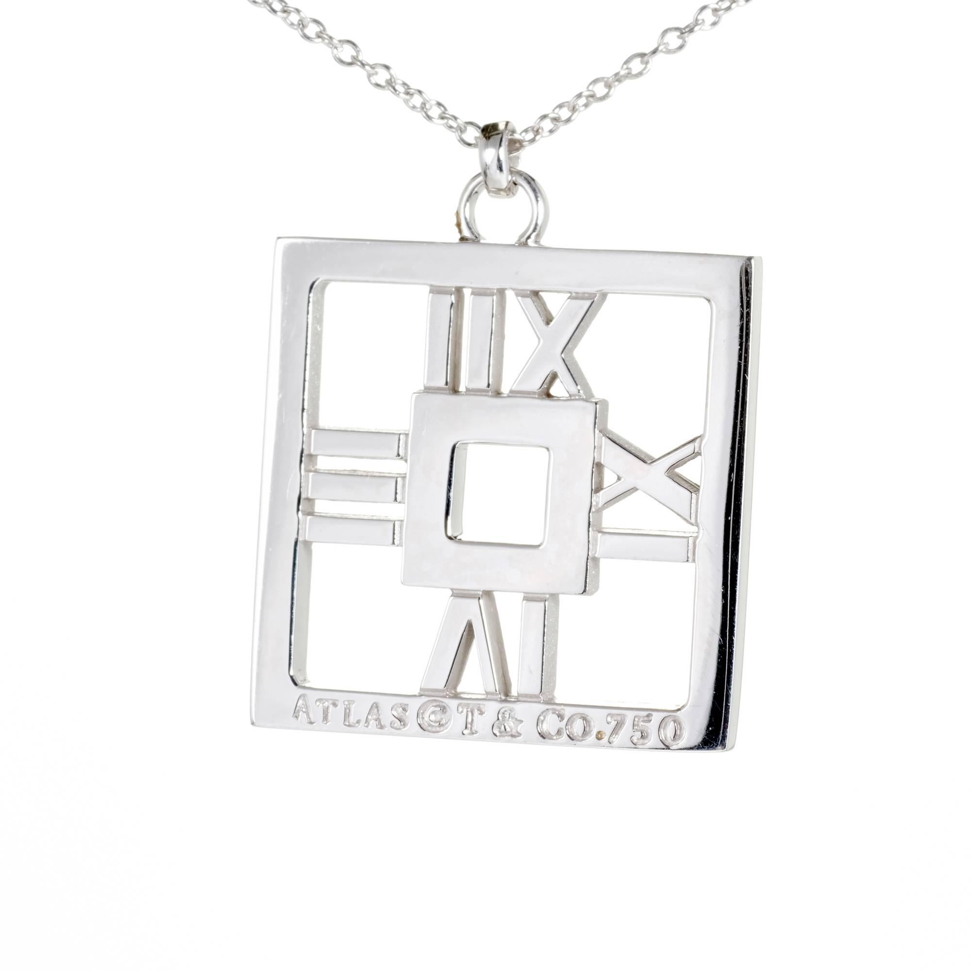 Tiffany & Co. diamond 18k white gold Atlas square numerical pendant necklace

16 round brilliant cut diamonds, approx. total weight .22cts, F-G, VS
18k white gold
Stamped: 750
Hallmark: Atlas Tiffany & Co
16 inch Tiffany chain
Width: 20.14mm
Depth: