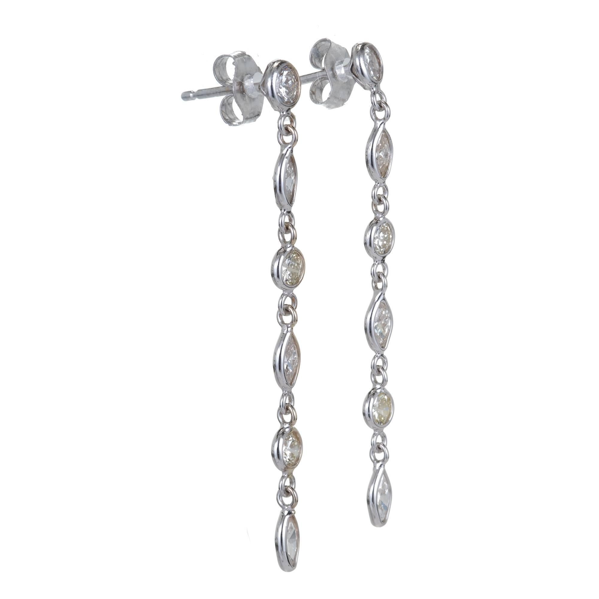 Handmade 14k white gold sparkly diamond dangle drop earrings. These earrings are from the Peter Suchy Workshop. Solid gold with cable chain 1.4mm and hand crafted diamond bezel rims designed to show off the diamonds sparkle.

6 round and 6 Marquise