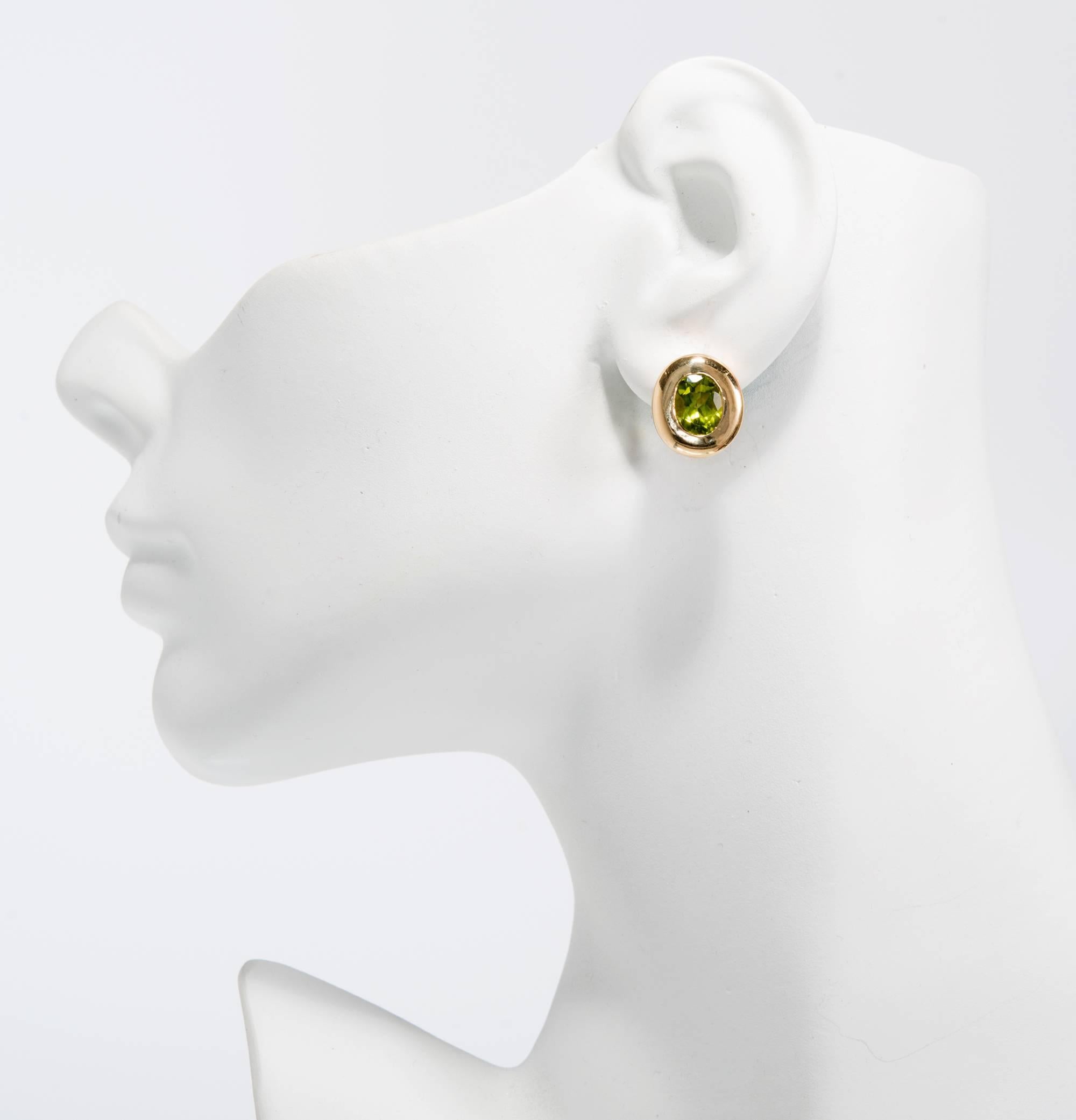 Women's 4.10 Carat Oval Green Peridot Domed Gold Bezel Stud Earrings