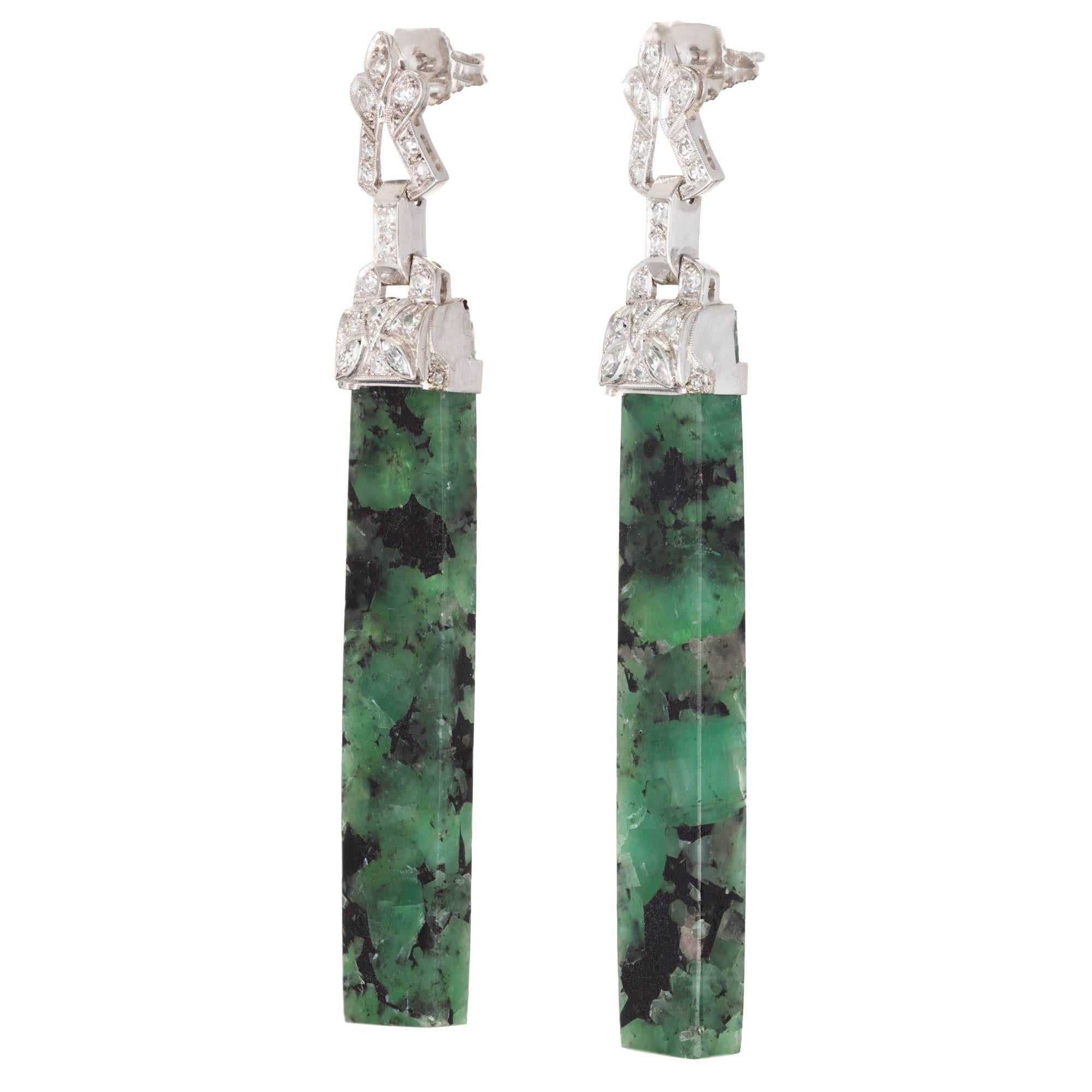 Emerald and diamond dangle drop earrings. Hinged Platinum tops set with single and Marquise cut diamonds.  Two perfectly marched natural totally untreated long Emerald rectangle slices with mottled green and black color and true translucent