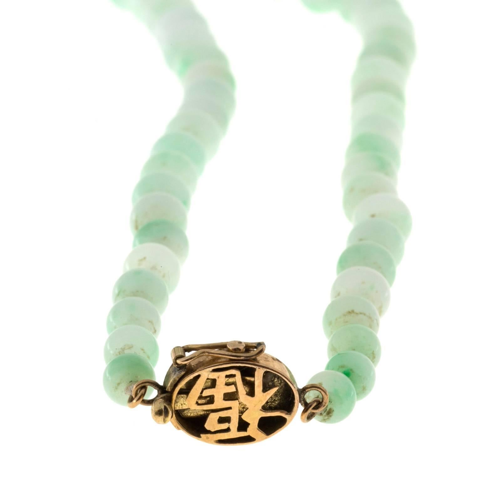 Translucent light green natural Jadeite Jade untreated. 20 inch long necklace. GIA certified

Length: 20 inches
Light green highly translucent natural untreated Jadeite Jade bead necklace 8.2 x 5mm. Natural color no impregnation. GIA certified #