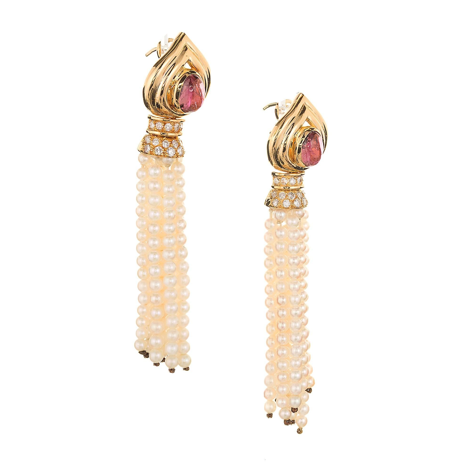 Stylish clip and post dangle earrings with pink Tourmaline tops, full cut diamonds and flowing cultured pearl dangle drop earrings. Circa 1960-1970.

2 oval cabochon pink tourmaline, approx. total weight 2.00cts, 8.5 x 6mm
38 round full cut