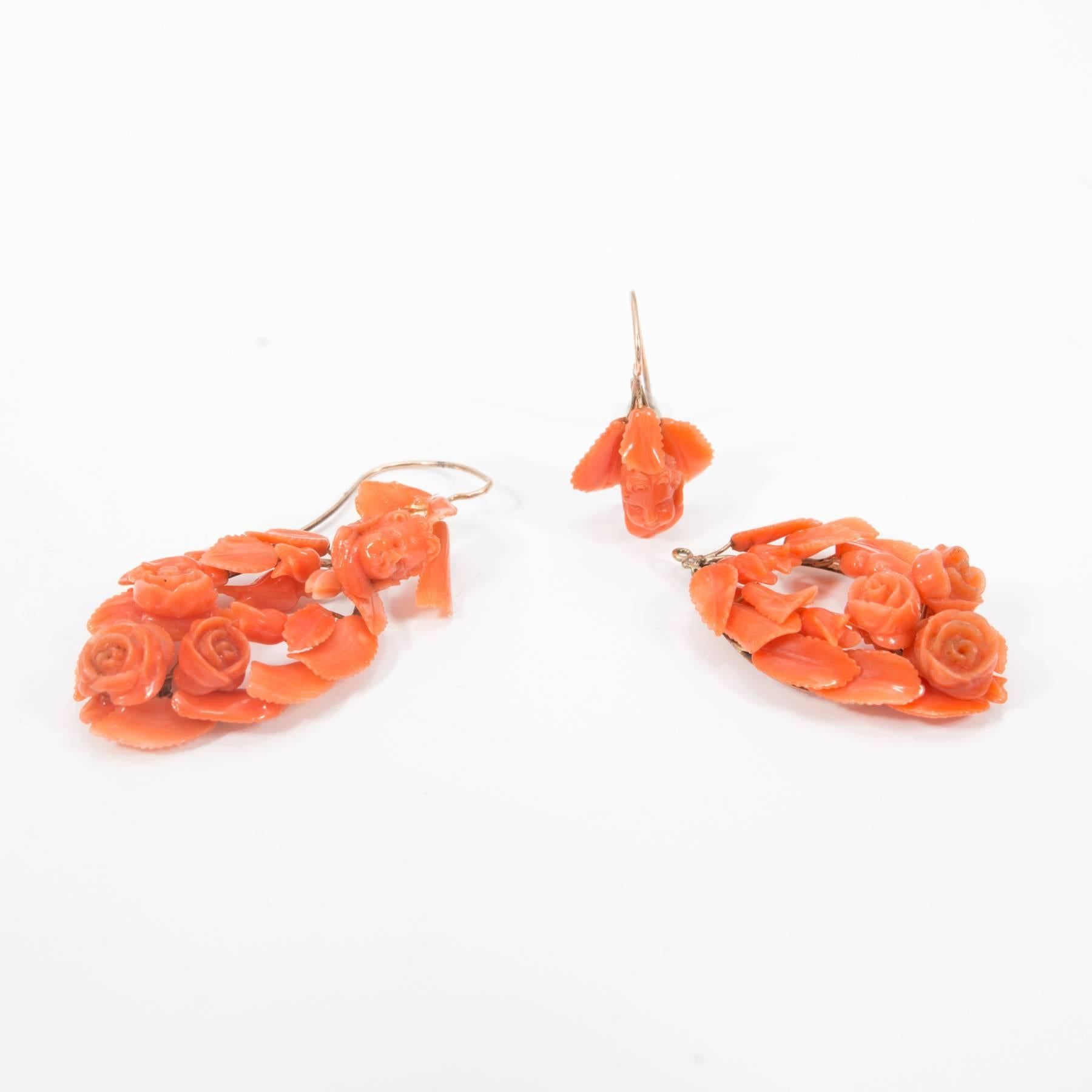 Carved Natural Coral Cameo Gold Angel Face Flower Dangle Earrings In Good Condition In Stamford, CT