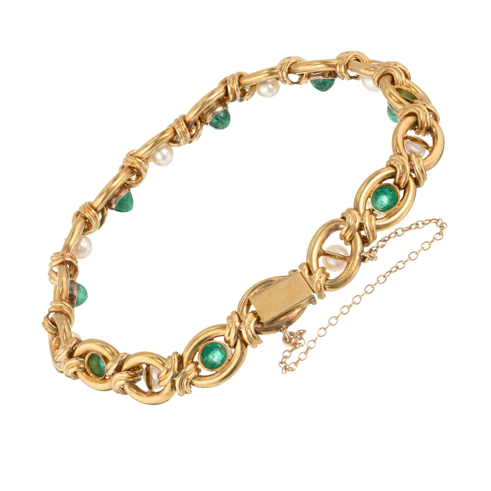 Handmade natural patina 14k bracelet with certified natural pearls and certified genuine natural color gem high dome cabochon Emeralds with faint clarity enhancement only. Circa 1910.

9 GIA certificate #21454482248 certified natural saltwater