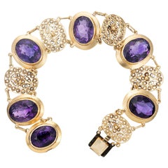 27.00 Carats Oval Amethyst Yellow Gold Filigree Filigree Link Bracelet