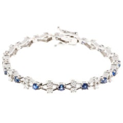 Blue Sapphire Round Diamond Gold "X" Bracelet