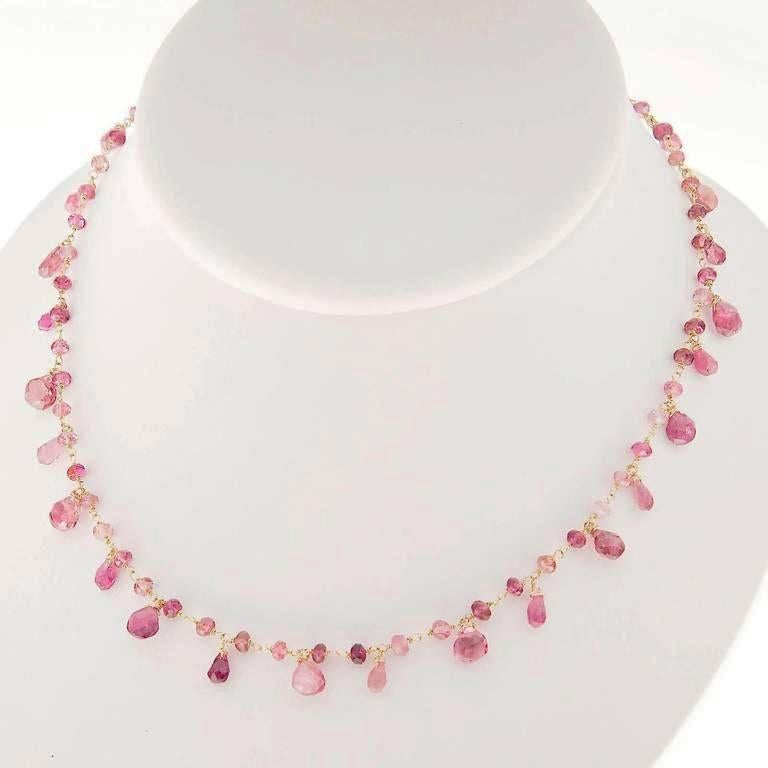 Handmade 14k rose gold wire necklace with faceted pink Tourmaline genuine untreated Briolettes and beads. Toggle catch. 

81 pink Tourmaline faceted beads 3.5mm to 6 x 6.5mm, approx. total weight 25.00cts
Length: 18 inches
14k Pink Gold
Tested: 14k