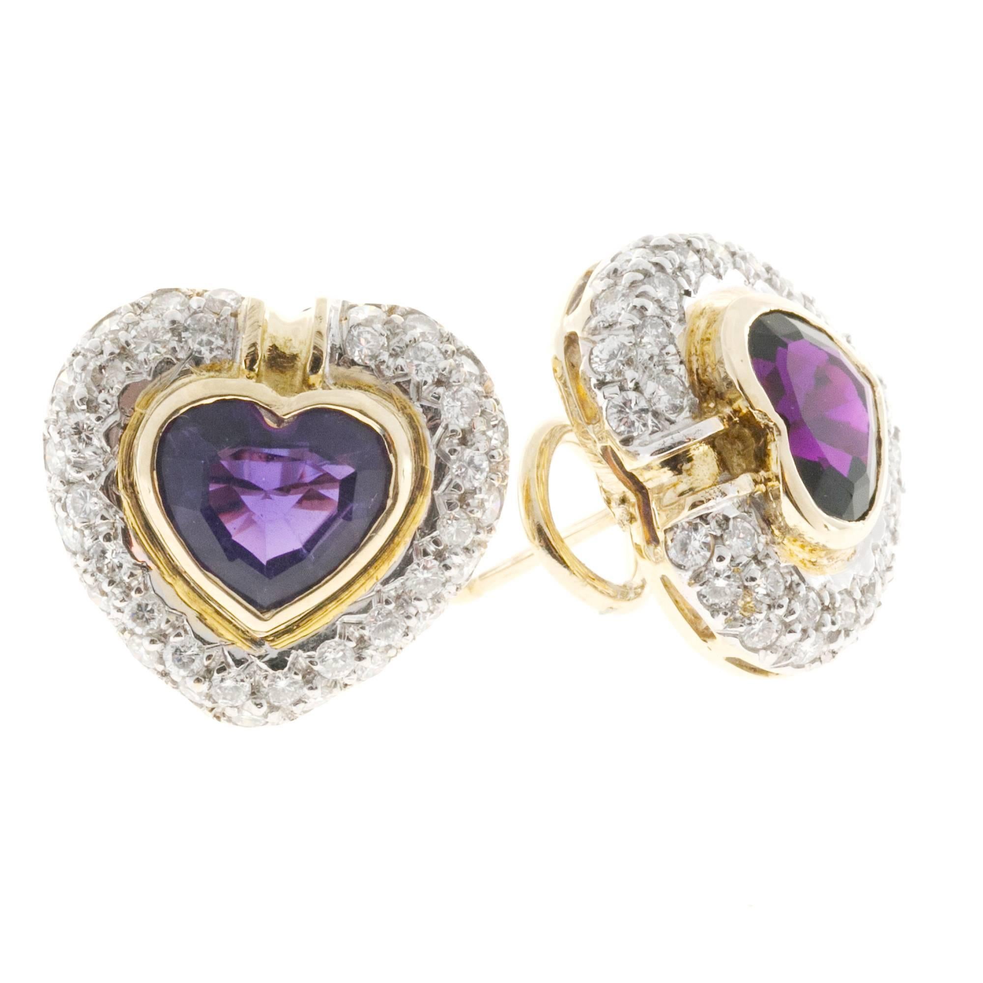 Solid 1960's clip post earrings with deep purple Amethyst surrounded by diamonds in 14k gold yellow and white gold . Circa 1960’s.

2 bright reddish purple Amethyst 8.8 x 7.5 mm, approx. total weight 3.50cts
74 full cut diamonds, approx. total