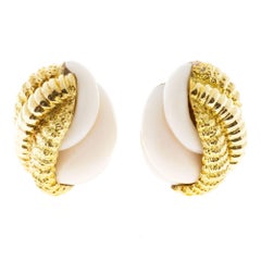 Carved Angel Skin Coral Gold Clip Earrings