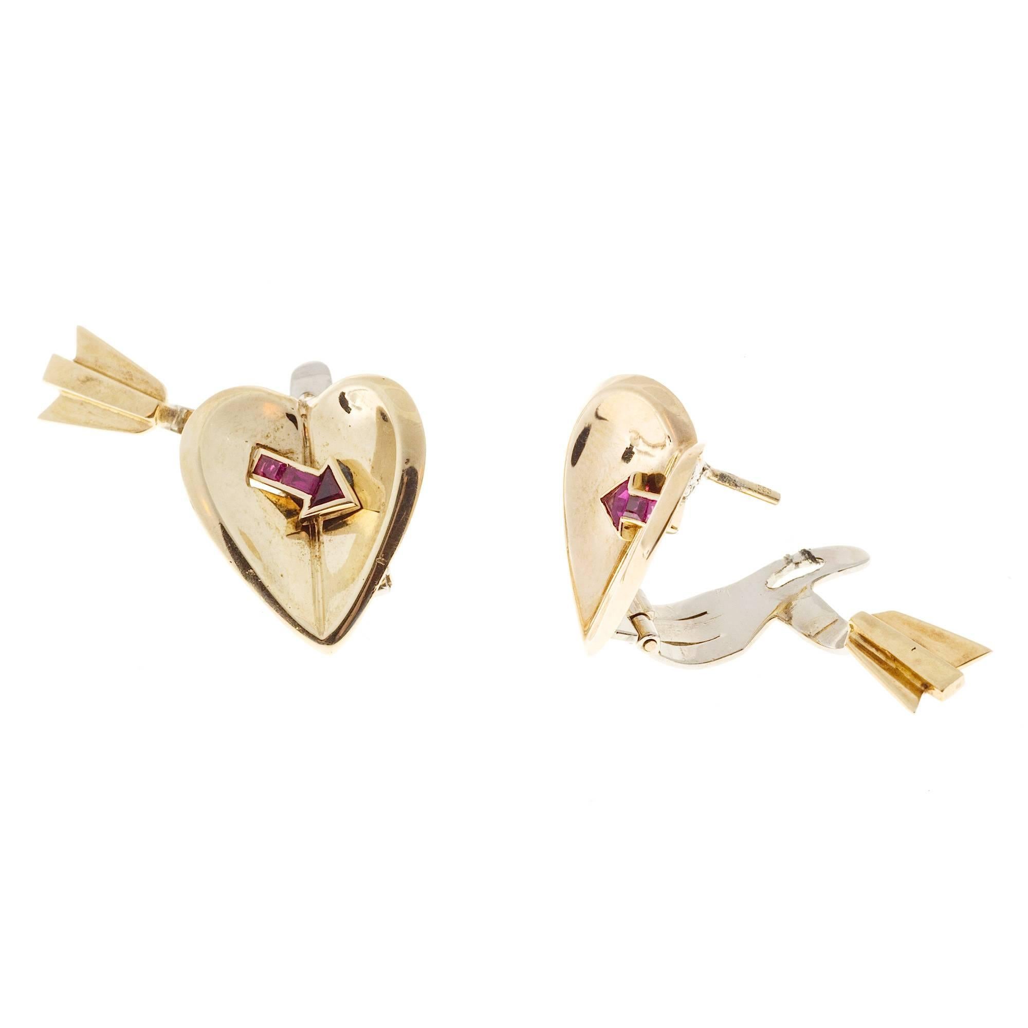 1940's Red Ruby Arrow Heart Gold clip post earrings.  Heart and Arrow design. With gem natural no heat Rubies. Original 3-D 1940 
2 triangle and four square gem bright red step cut Rubies. GIA certificate # 2145666025 red no heat no enhancement CMT