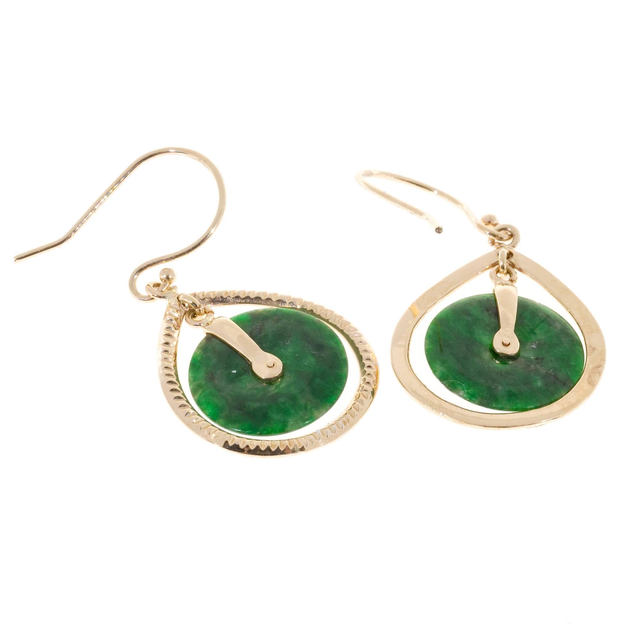 Natural untreated color jadeite jade 14k Rose gold dangle earrings  GIA Certified: 1142580113.

Tested: 14k rose gold
Weight: 2.8 grams
Top to bottom: 31mm or 1.22 inches
Width: 16mm or .63 inches