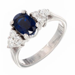 1.25 Carat Oval Sapphire White Diamond Gold Engagement Ring