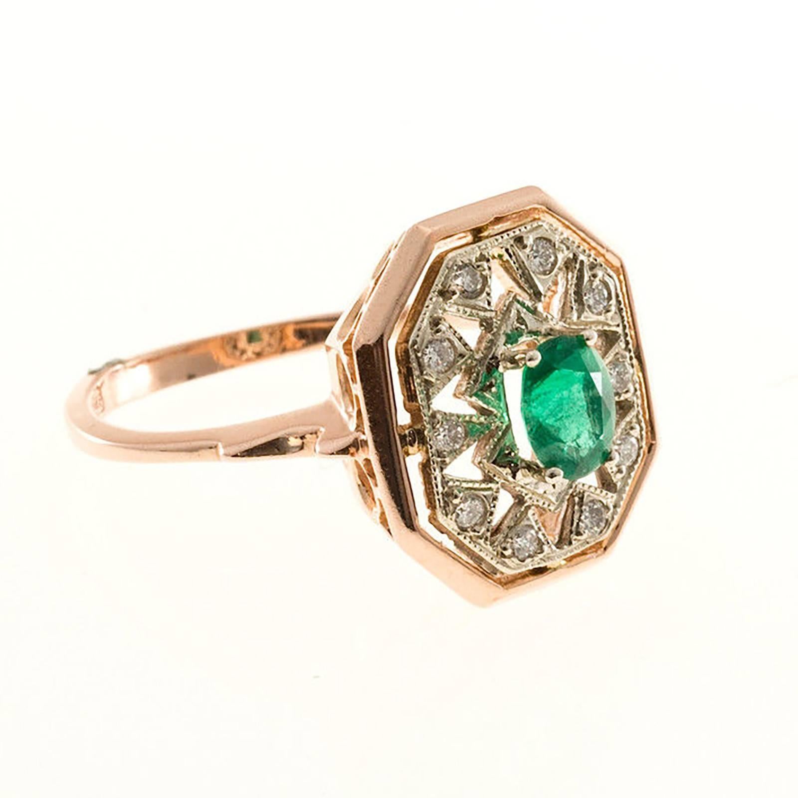 14k rose gold oval emerald and diamond open work ring. 

1 oval genuine fine Emerald, approx. total weight .50cts, 5.8 x 4.6mm
10 round full cut diamonds, approx. total weight .20cts, G, VS
14k rose and white gold
Stamped: 585
4.6 grams
Width