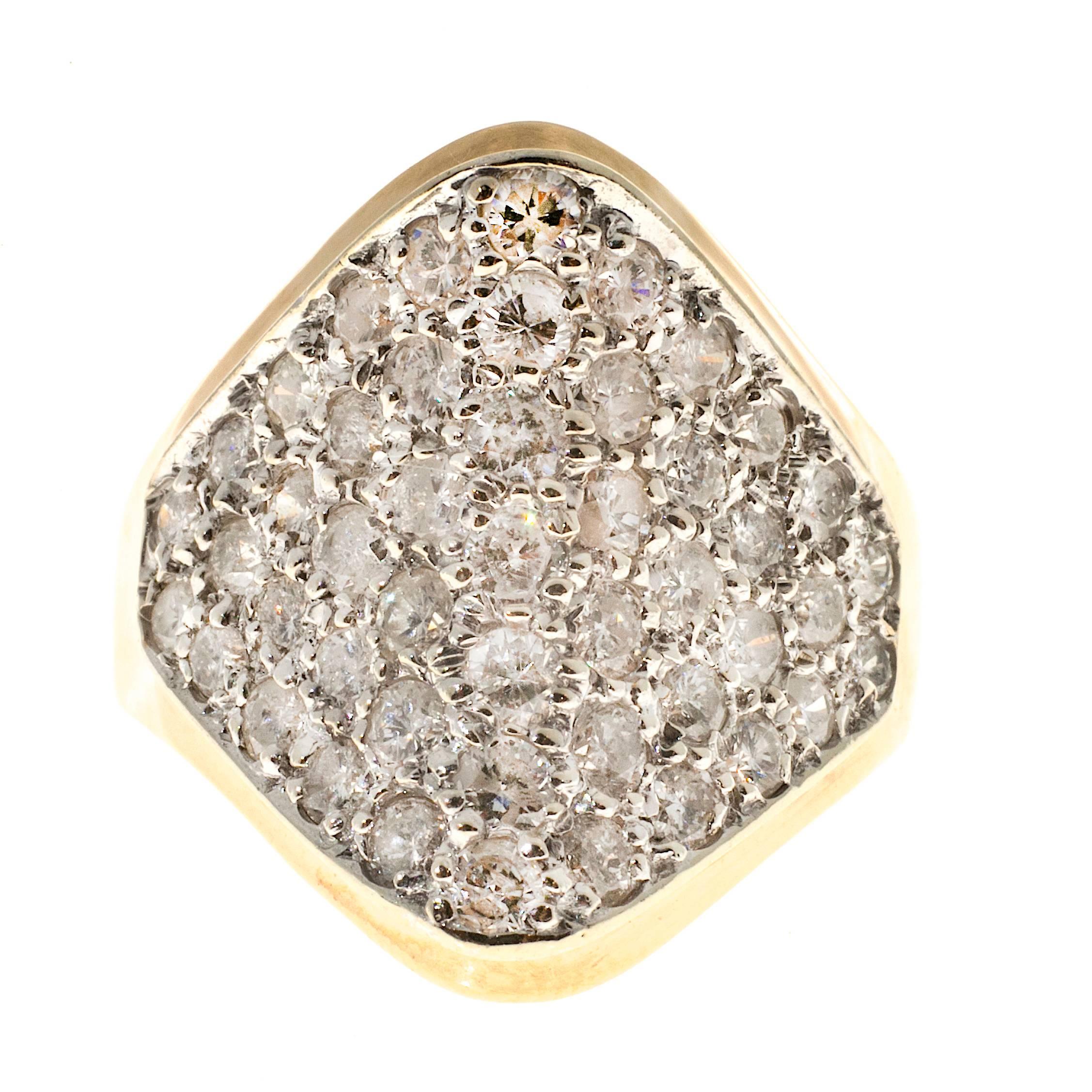 White gold center plate pave set end to end with bright white sparkly diamonds all full cut. The setting itself is 14k yellow gold. 

47 round diamonds approx. total weight 1.50cts, F color, SI to SI3 clarity
14k Yellow Gold
Stamped: L 14k
8.1