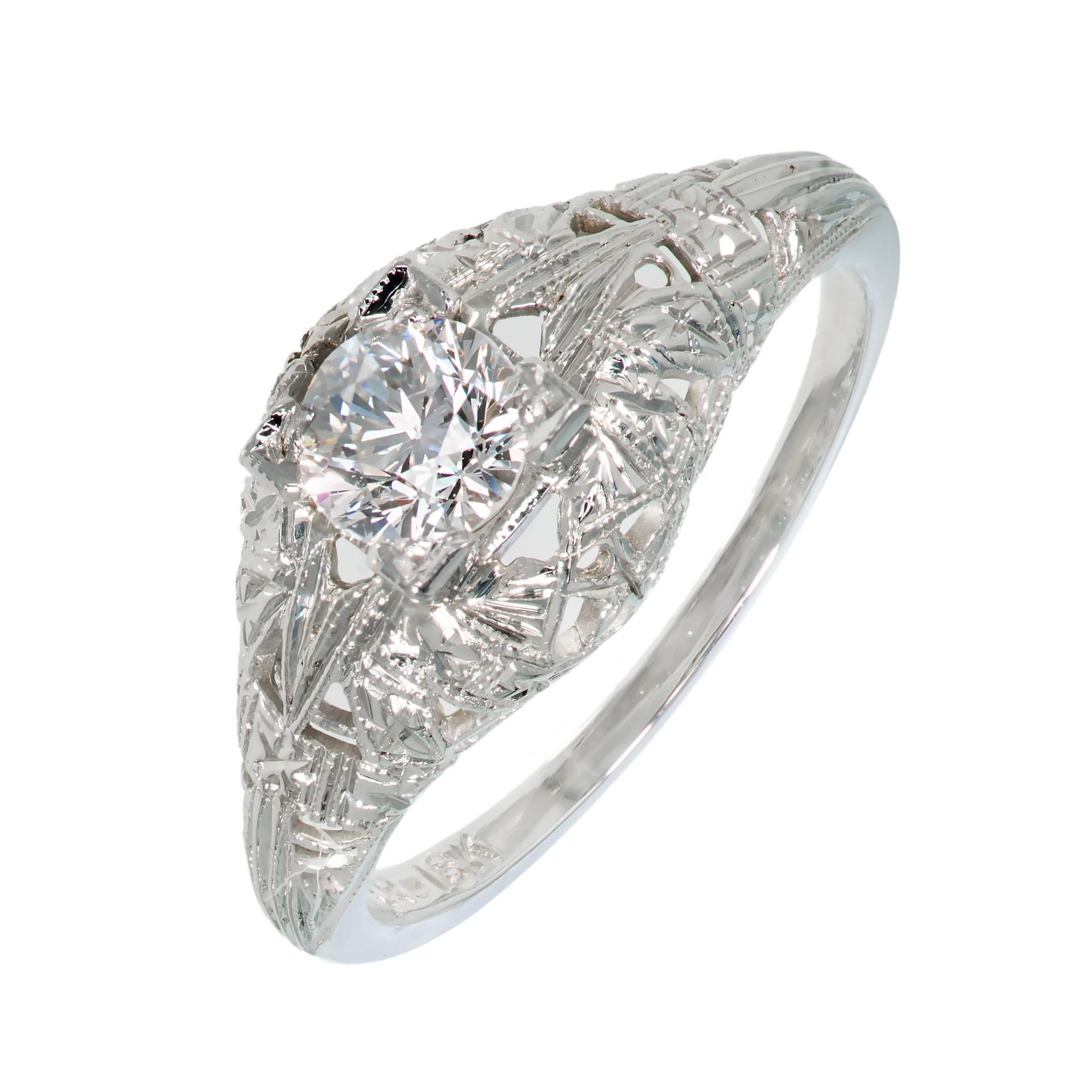 Art Deco 1920s diamond in a domed hand pierced 18k white gold engagement ring. crt

1 old European cut diamond, approx. total weight .45ct, E to F, VS2, 4.80 x 4.76 x 3.14mm.
Size 6 and sizable
18k White Gold
Tested and stamped: 18k
Hallmark: UR
2.6