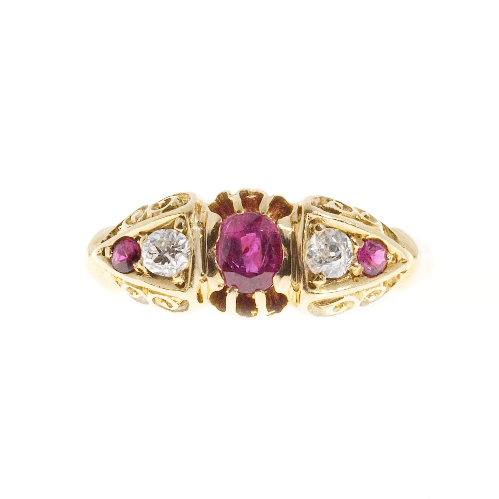 Rare and beautiful late 1800’s 18k yellow gold engagement ring with top gem natural rubies- GIA certified natural and no heat. Two nice old mine cut diamonds. Handmade Victorian ring

1 Oval 4.62 x 3.43 x 2.19mm brilliant cut ruby SI Approx.  .30ct
