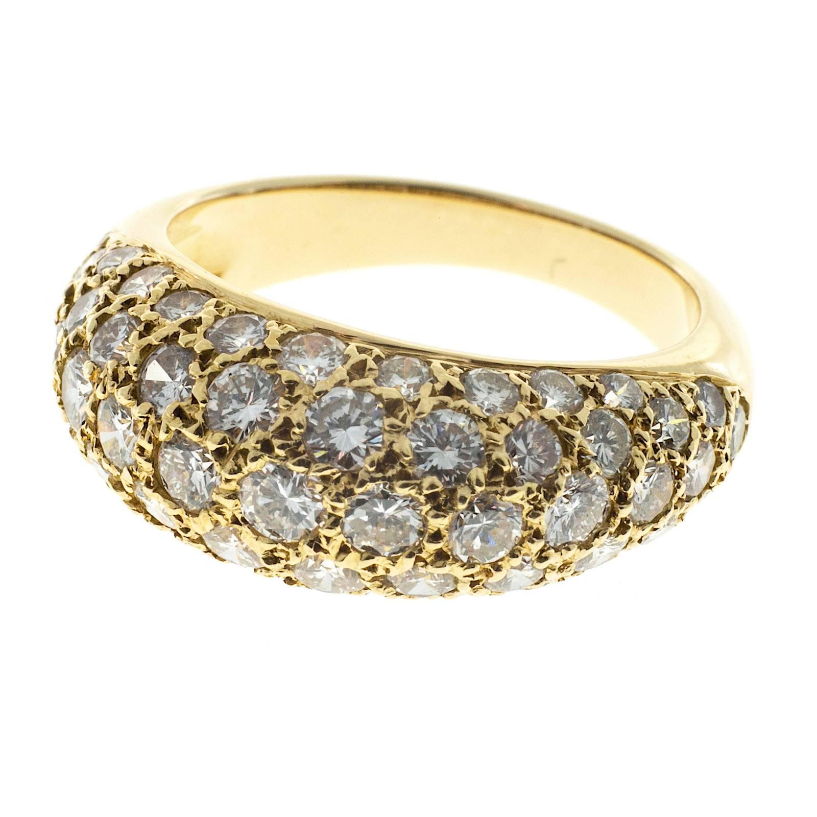 Pave diamond dome ring with excellent sparkly full cut diamonds.

57 full cut diamonds, approx. total weight 1.00cts, G, VS
18k Yellow Gold
Tested: 18k
European hallmarks
5.4 grams
Width at top: 8mm
Height at top: 4.5mm
Width at bottom: 3mm
Size 5