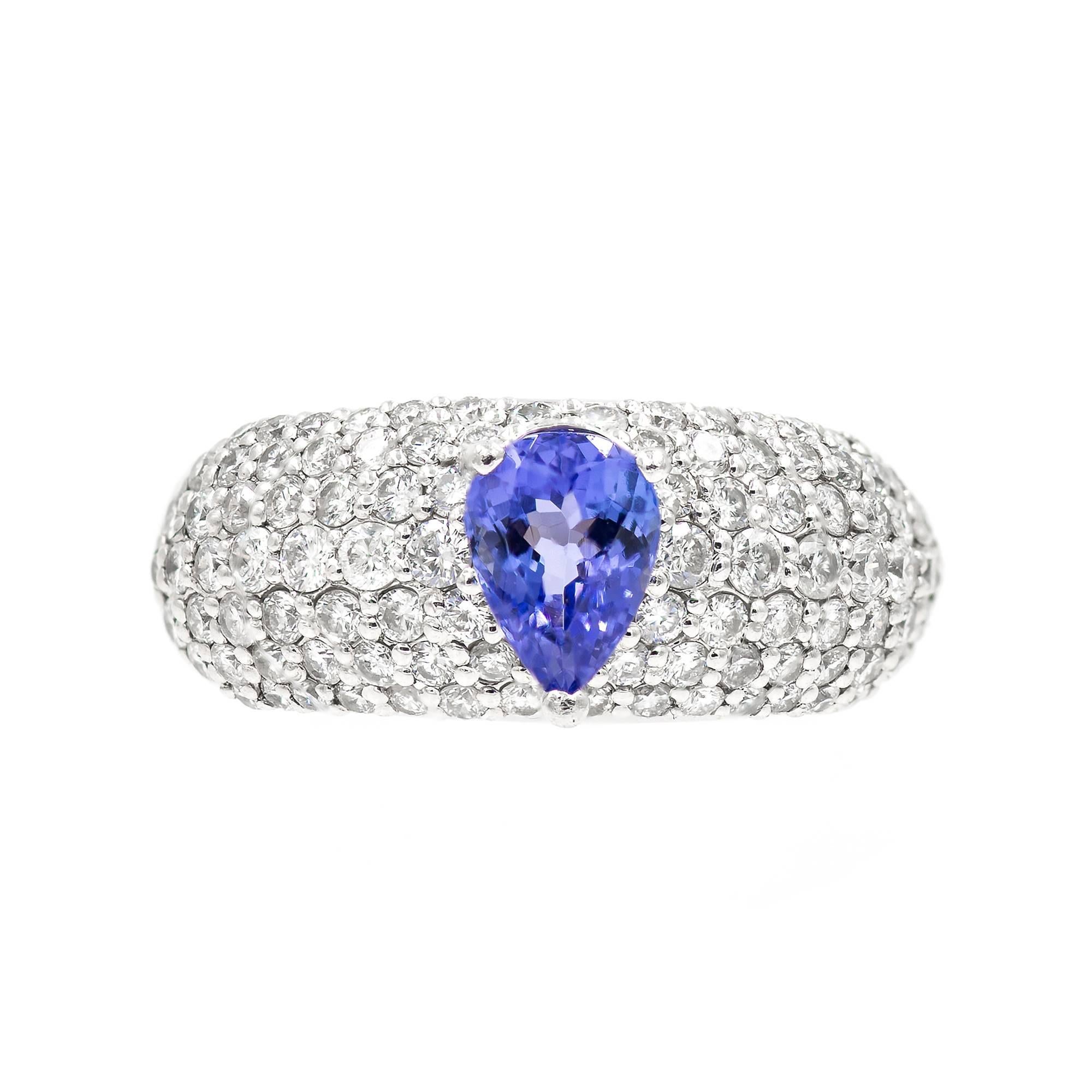 .75 Carat Pear Shaped Blue Tanzanite Bead Set Diamond Platinum Engagment Ring For Sale