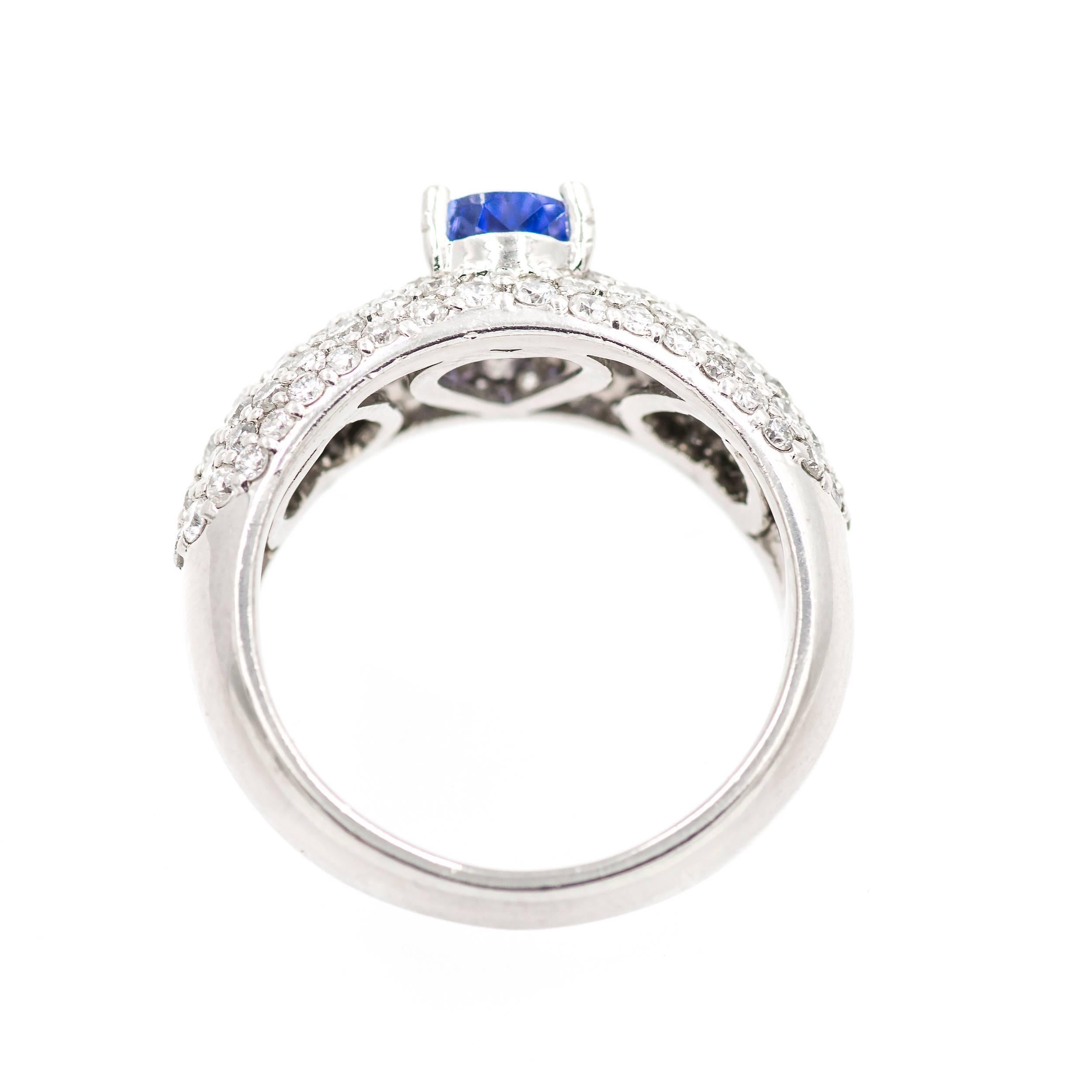 Women's .75 Carat Pear Shaped Blue Tanzanite Bead Set Diamond Platinum Engagment Ring For Sale