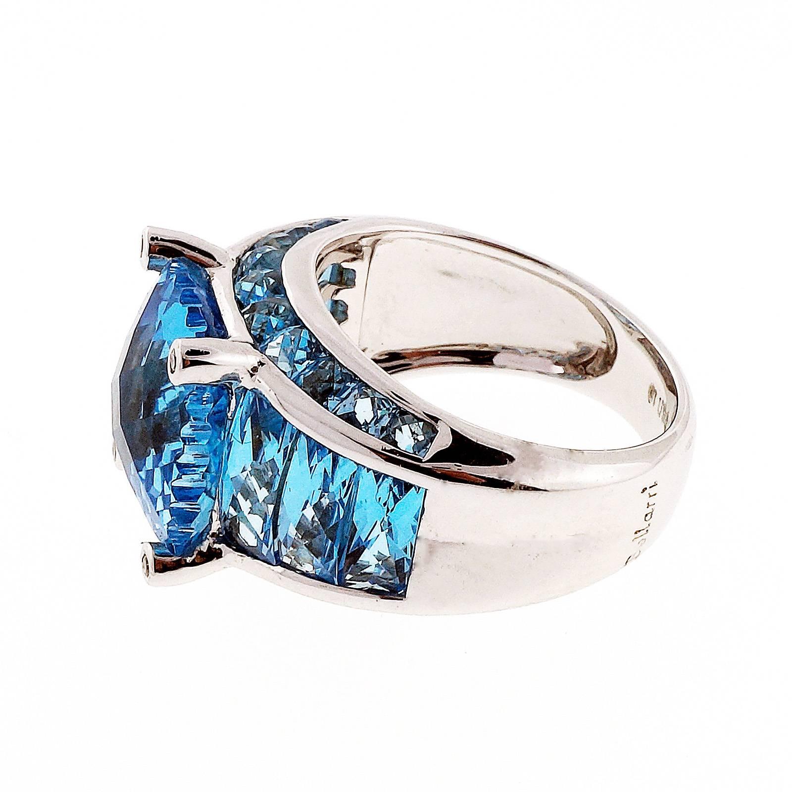 Bellarri designer 18k white gold extra fine blue Topaz and diamond ring. 

28  blue Topaz custom cut stones, approx. total weight 13.58cts, VS, center cushion 12.5 x 10.5mm
4 full cut diamonds, approx. total weight .03cts, G, VS
Size 7.25 and