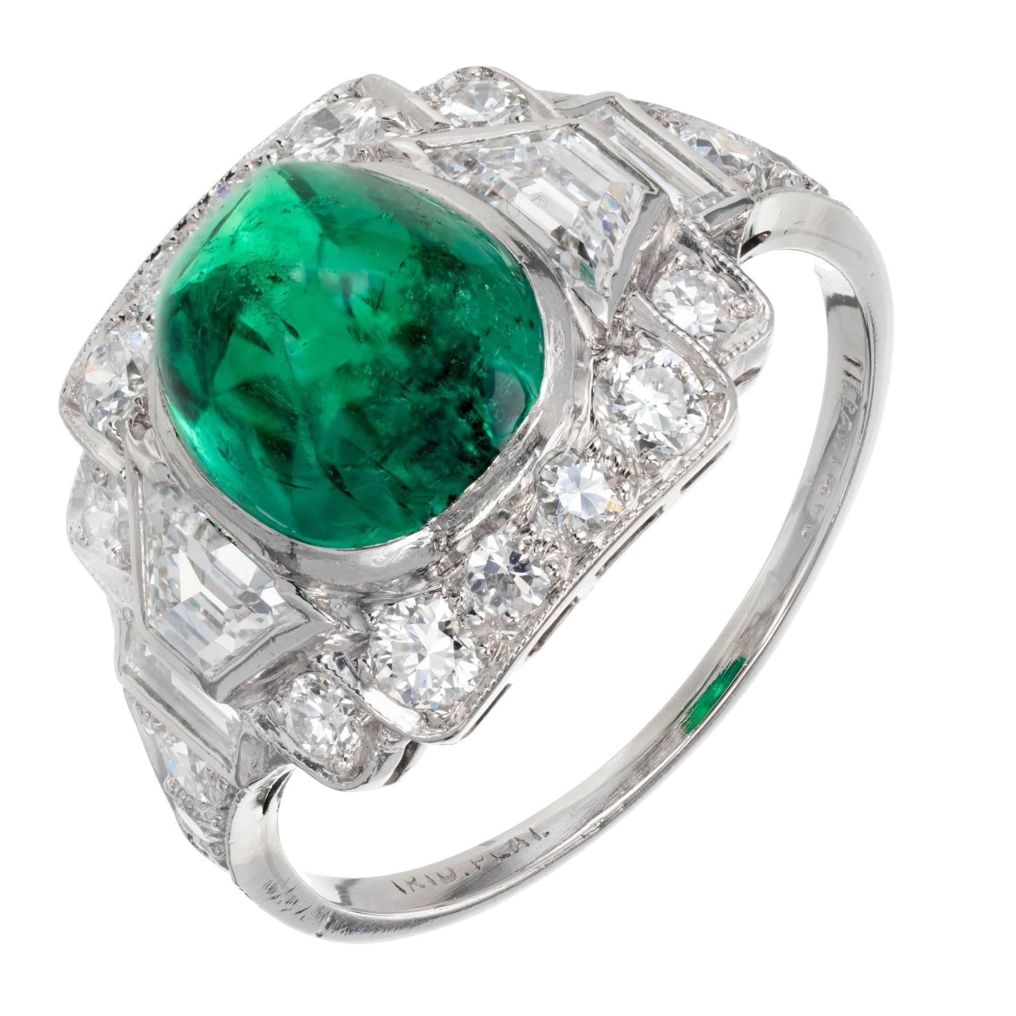 Original early 1900s Tiffany & Co Emerald and diamond Art Deco cocktail ring. Approx. 1910. Platinum setting with a high dome sugar loaf cabochon cut GIA certified natural Colombian Emerald and accent side diamonds.. Partially worn but readable
