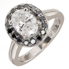Retro GIA Certified .96 Carat Oval Diamond Black Diamond Halo Platinum Engagement Ring