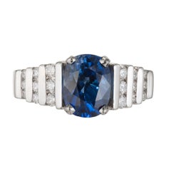 Anillo de compromiso en platino con zafiro ovalado azul de 2,79 quilates y diamante certificado por GIA
