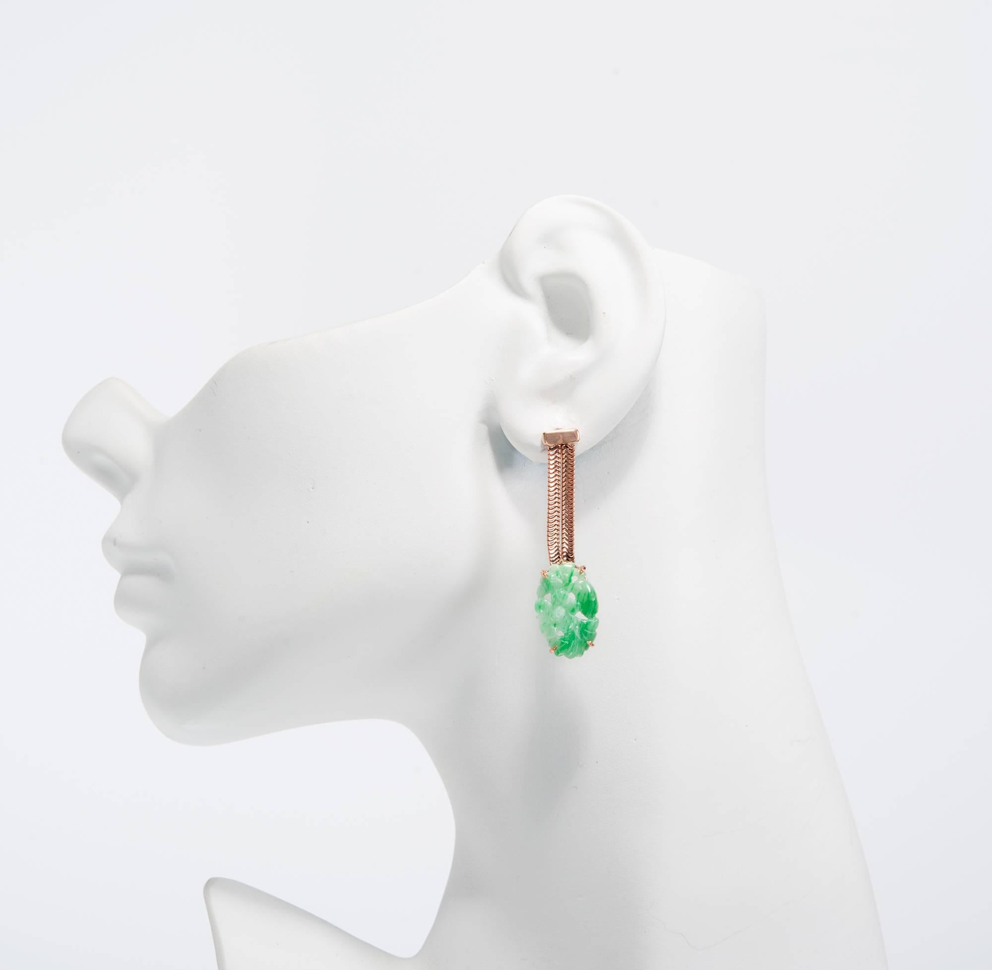 Peter Suchy 14k rose gold dangle earrings with GIA certified natural color well-polished Jadeite Jade earrings. Stones removed for certification and reset by Suchy Jewelers. 

1 variegated green Jadeite Jade, approx. total weight 6.63cts, opaque,