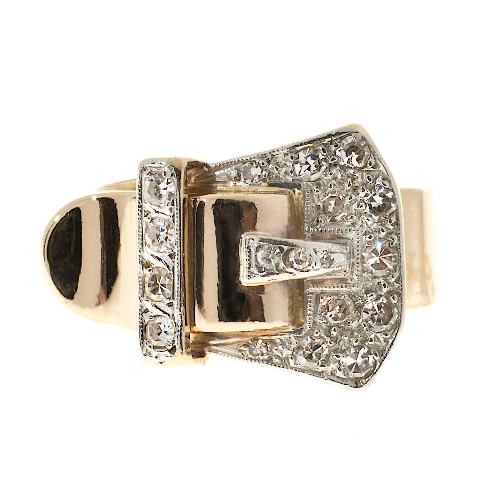 Retro Art Deco 1935 buckle ring in 18k rose and white gold. Bright single cut diamonds. 

18 round diamonds, approx. total weight .25cts, H, SI
18k rose and white gold
7.7 grams
Tested: 18k
Width at top: 14.67mm
Height at top: 6.50mm
Width at