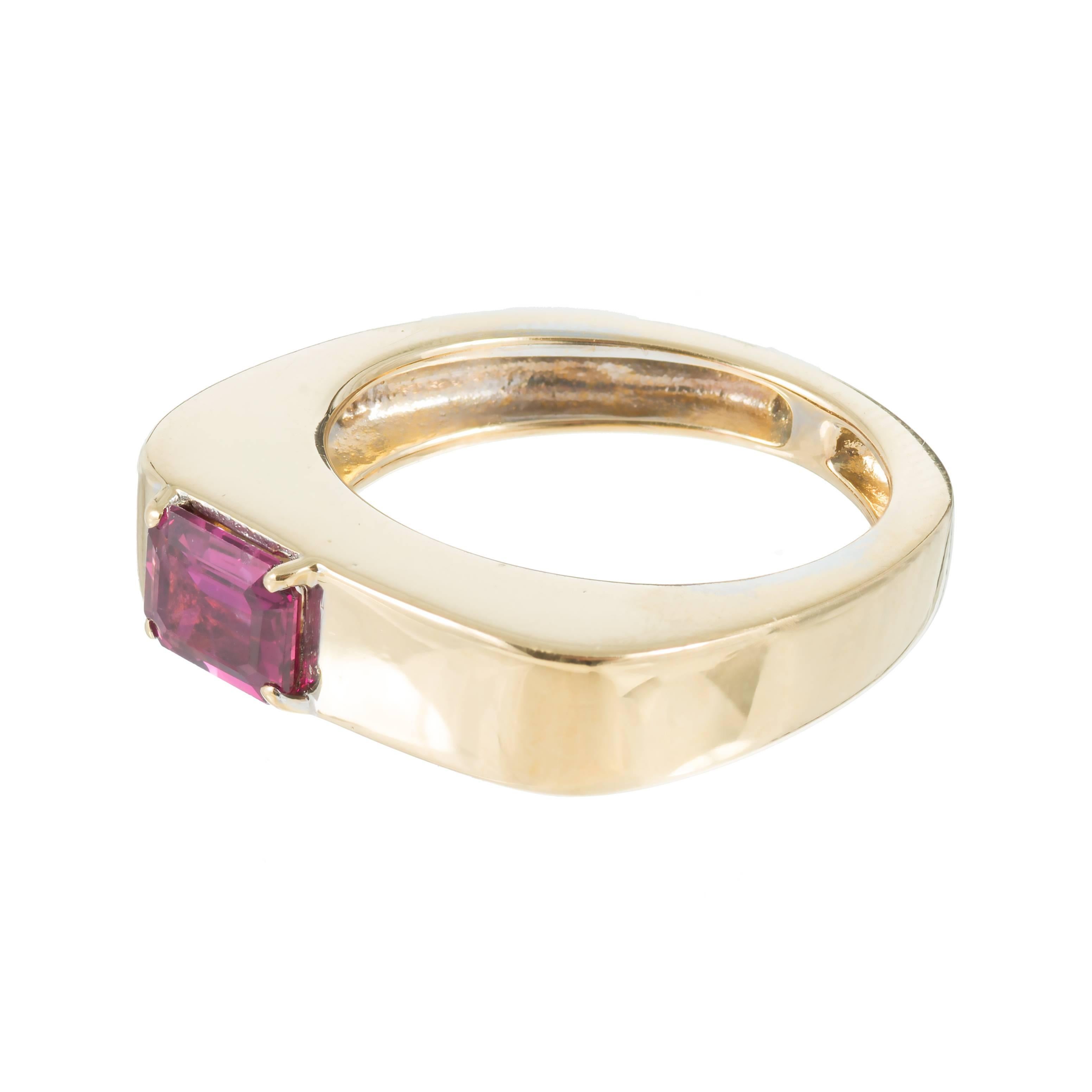 Solid 18k yellow gold ring with a bright red genuine Ruby 0.70ct. 

1 Emerald cut bright red Ruby, approx. total weight .70cts, SI1, 6.28 x 4.76 x 2.05mm
Size 6.25 and sizable
18k yellow gold
Tested and stamped: 18k
8.3 grams
Width at top: