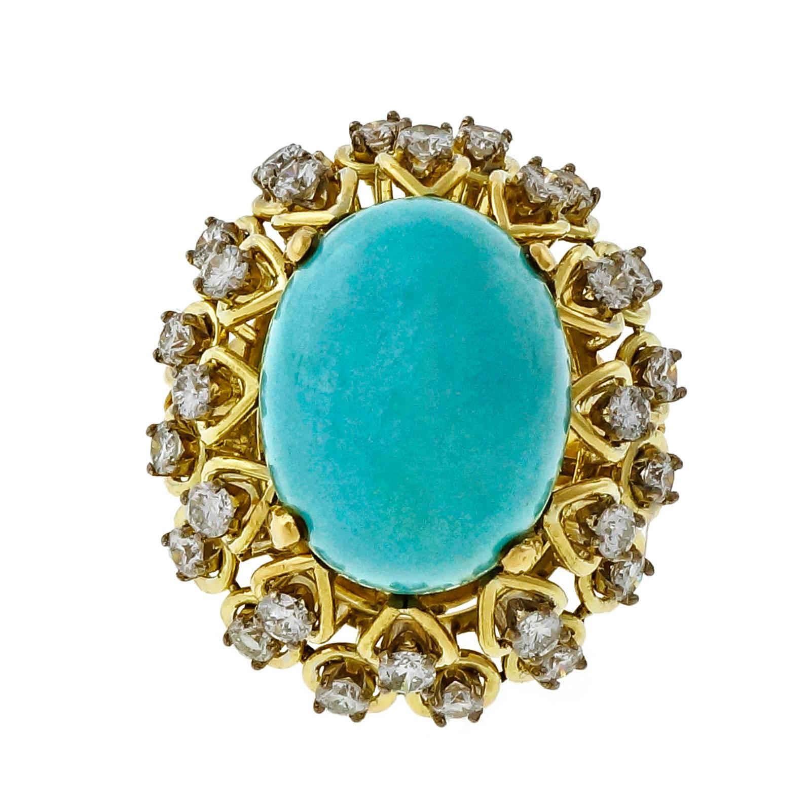 1960’s Jack Gutschneider 18k yellow gold ring with fine full cut diamonds and a natural color Persian Turquoise treated with porosity blockers to prevent stains and fading. Natural color. Porosity blocker only natural color. Platinum heads for