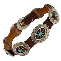 A Navajo turquoise and hammered wagon-wheel concho belt